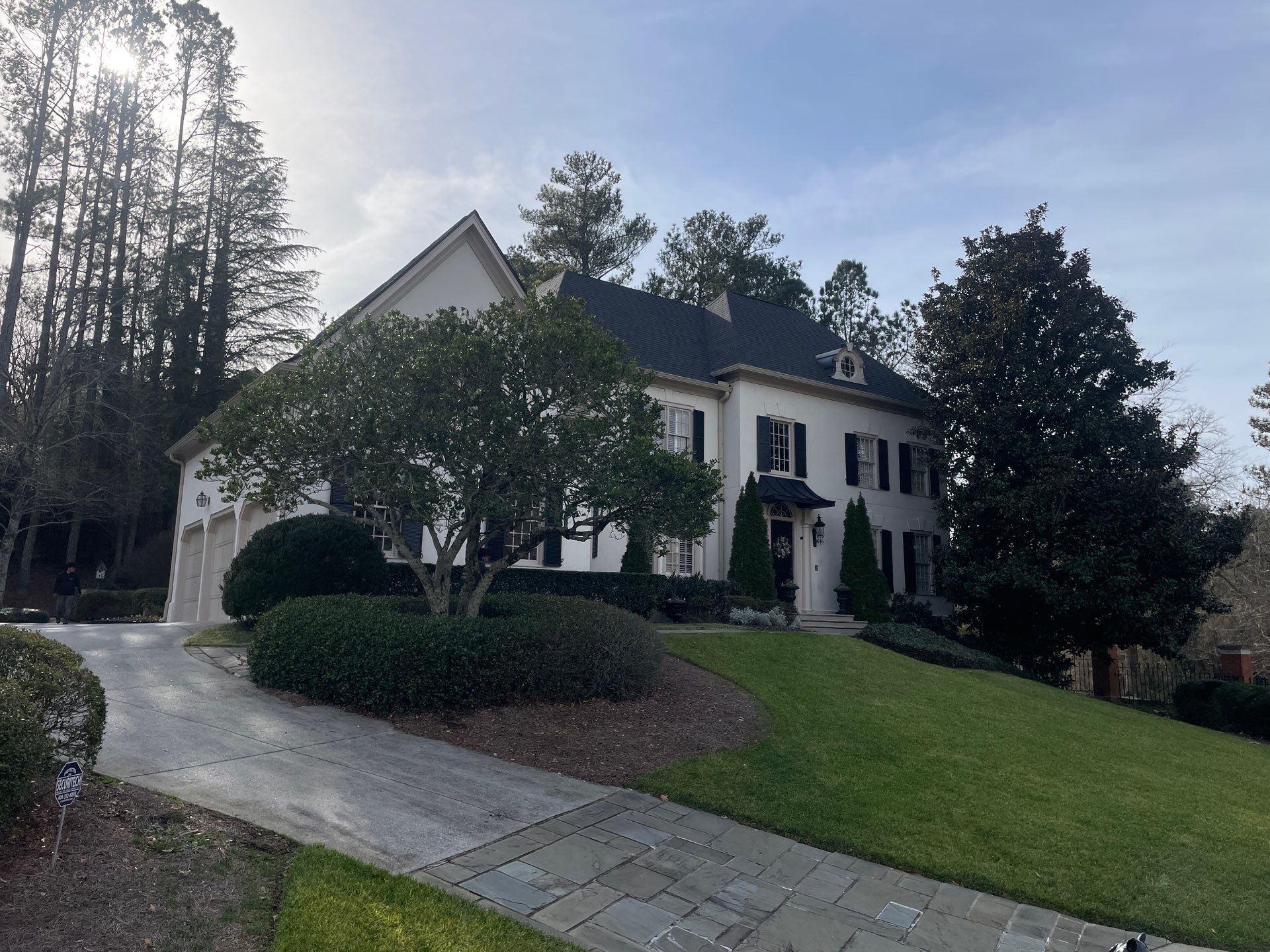 Cleaning Gutters  by Deerfield Roofing LLC