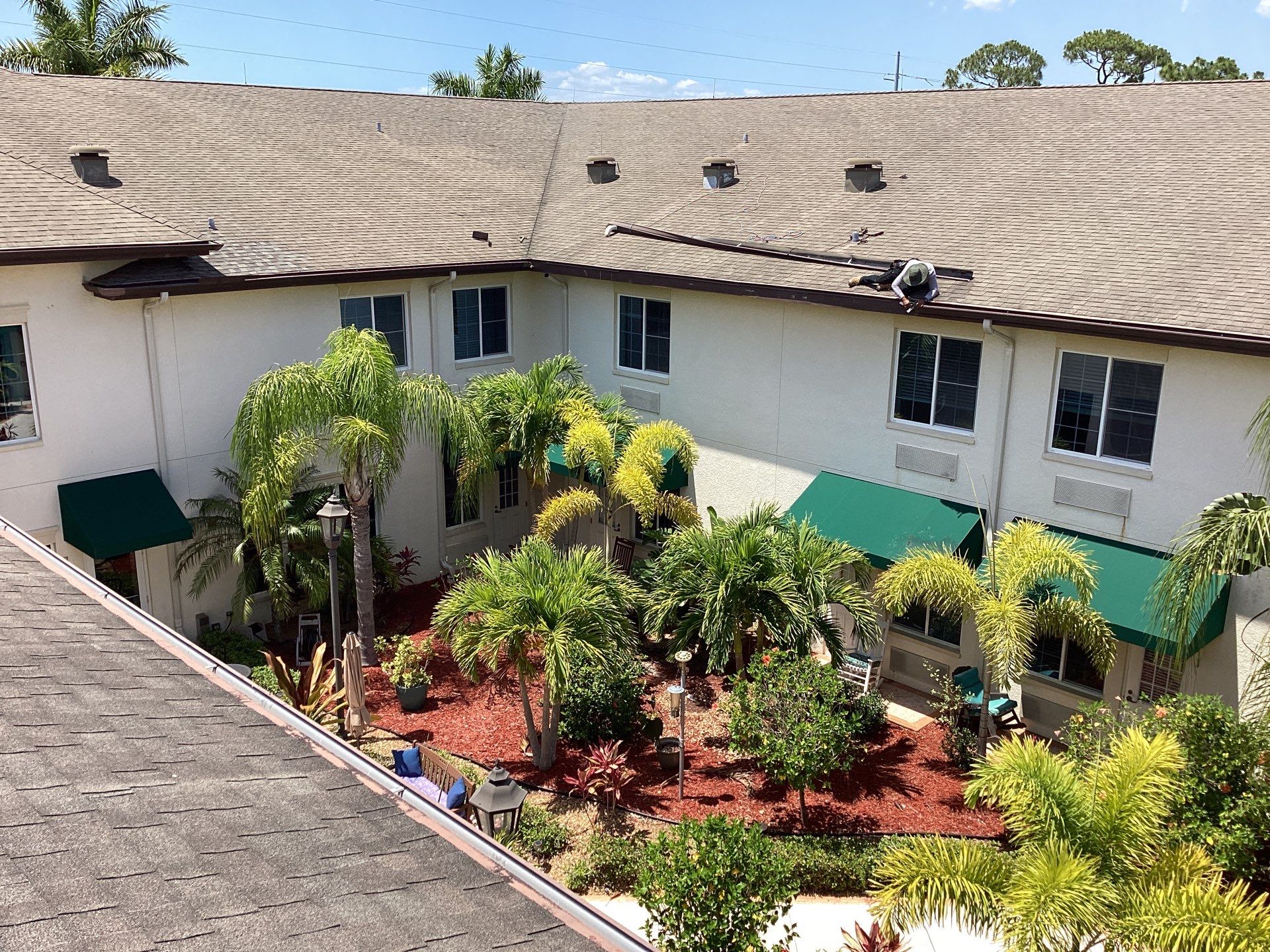 Musket Brown Seamless Gutters using Musket Brown Seamless Gutters in Capen Coral FL by Gutter Professors