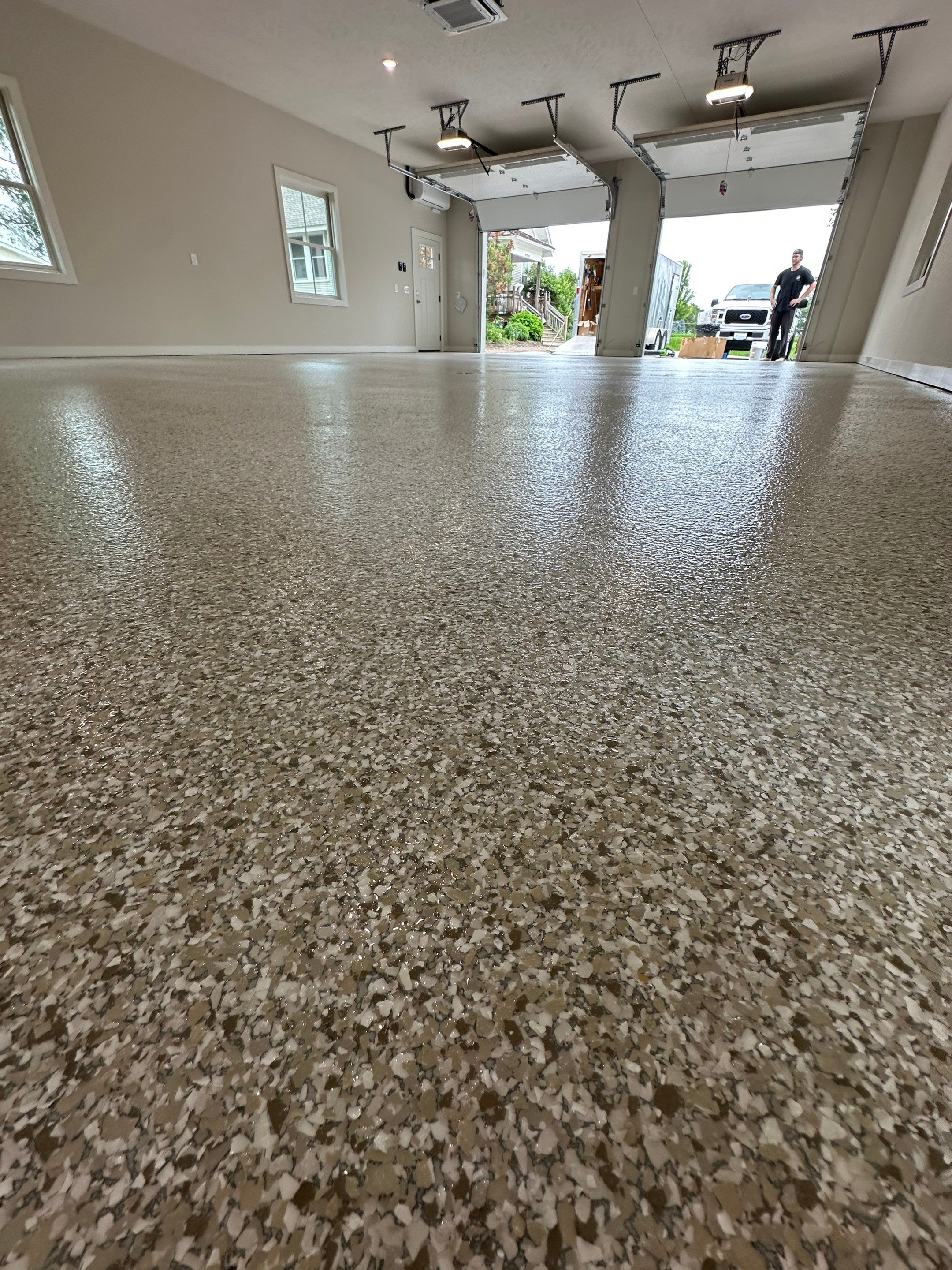 Trail Mix Epoxy Garage / Even Space by Goat Coatings