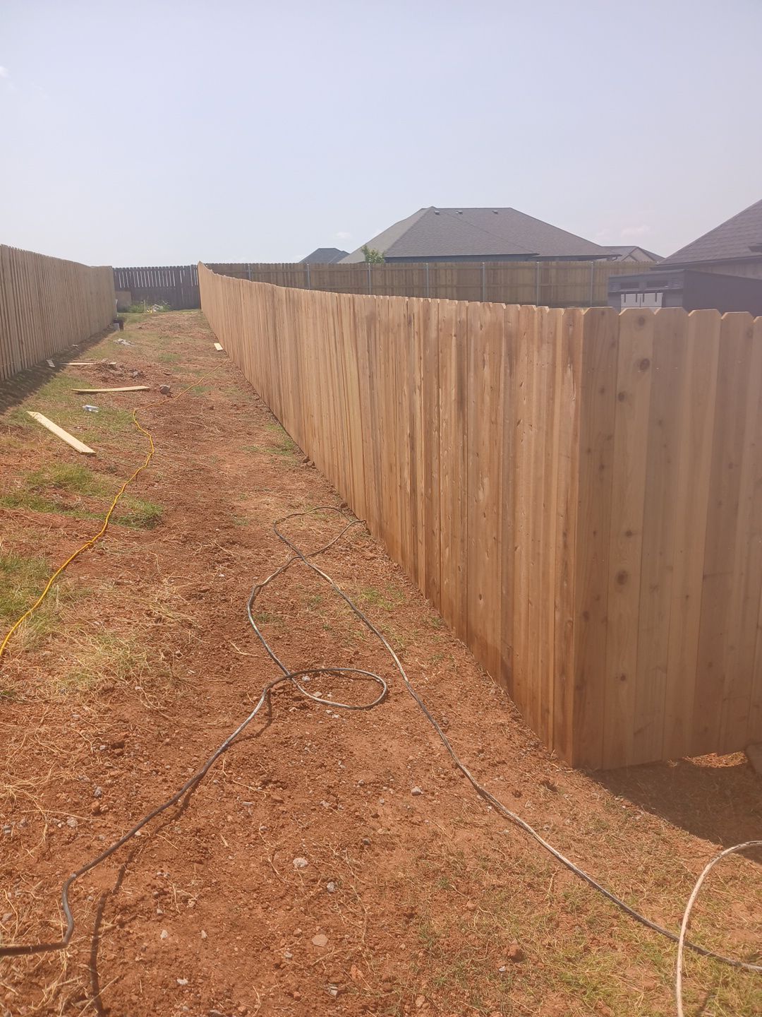 Cedar Fence using Metal Poles by Clays Services Inc