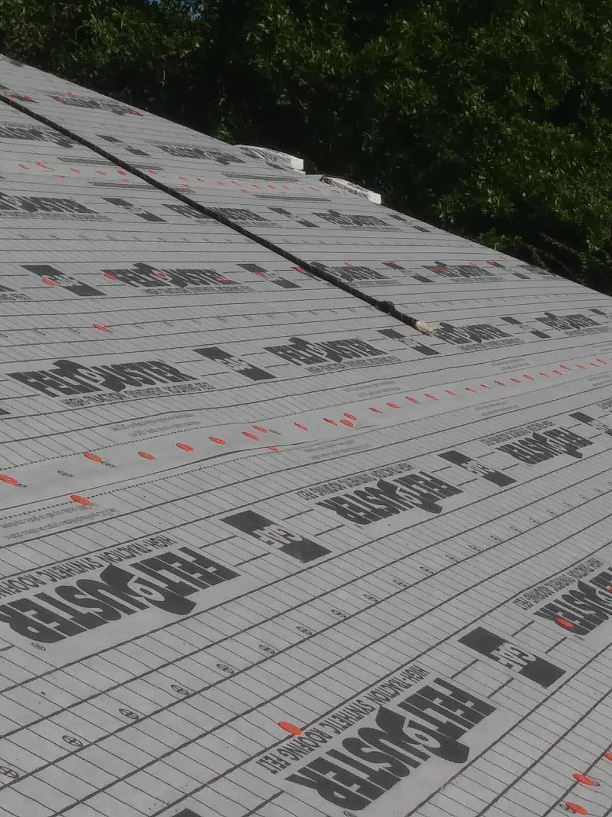 Residential Roofing Installation using Roof Replacement by American Roofing & Construction LLC
