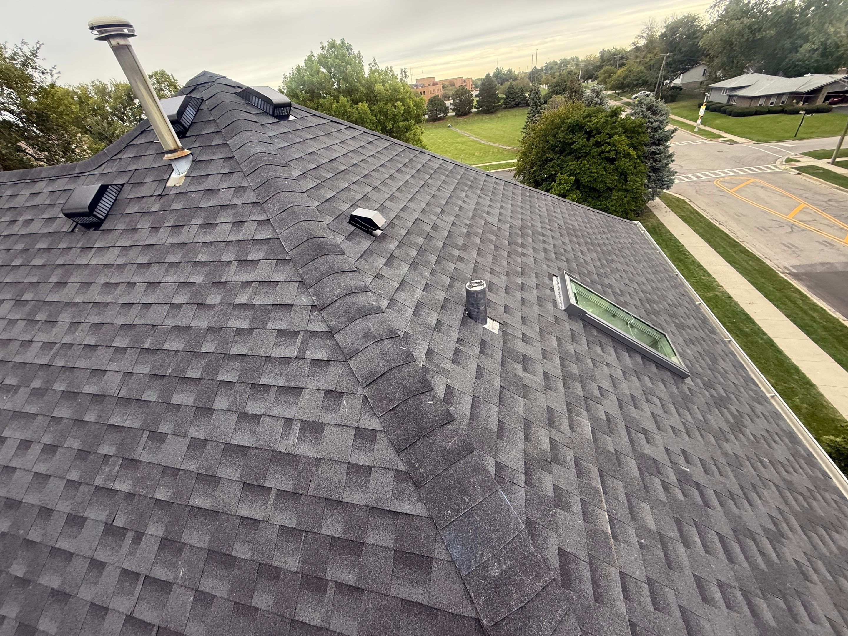 Roof and windows by Optimal Home Improvement 