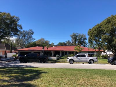 Residential Re-Roof using MS Metals, Copper Penny, Standing Seam.