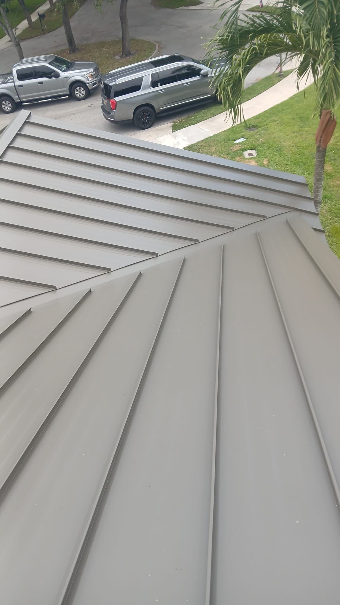 Residential Standing Seam Metal and Polyglass Flat Roof Replacement Boca Raton by AJF ROOFING INC