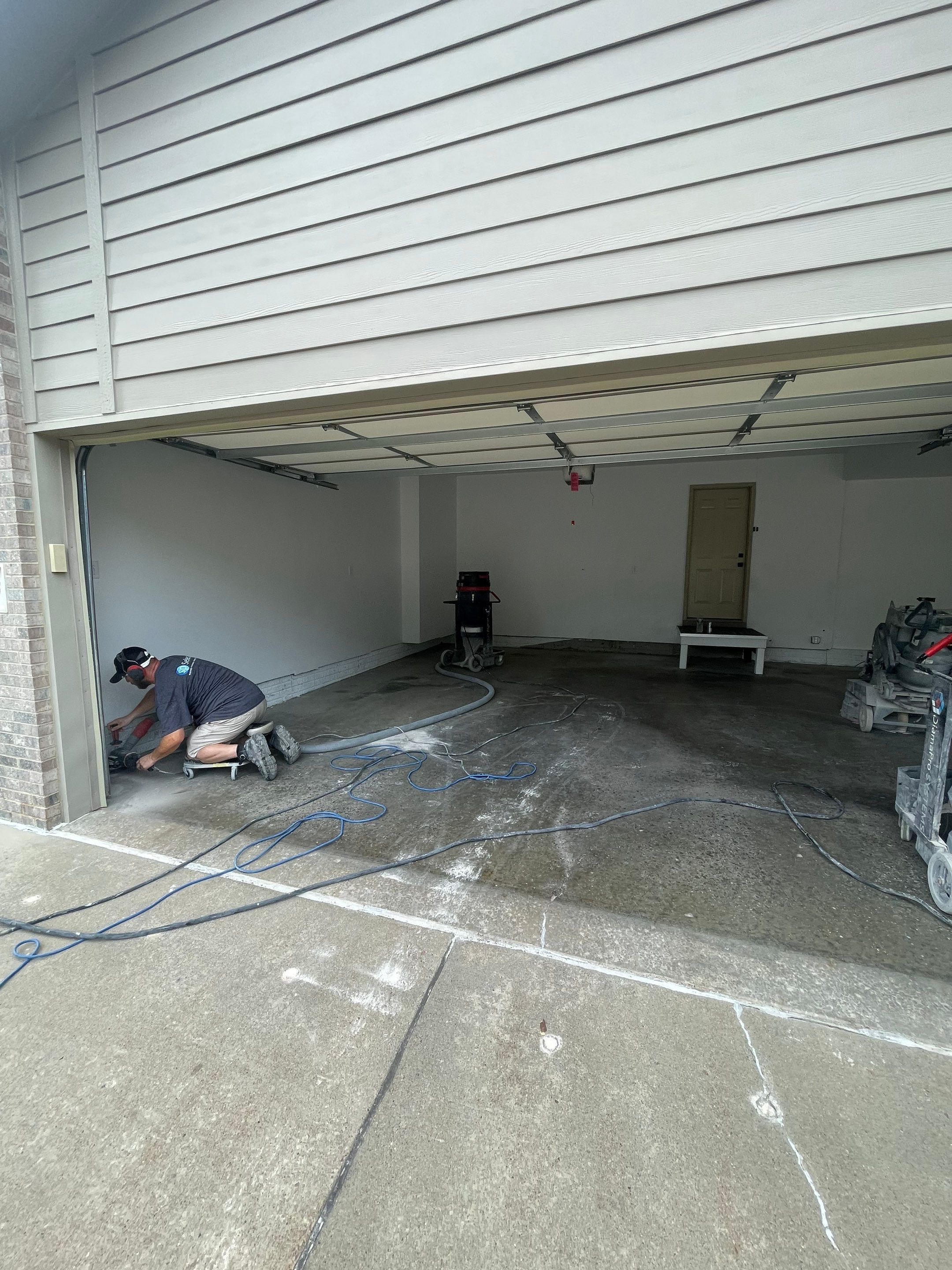 Cabin Fever Garage Floor System in Sioux Falls by Select Painting, Coatings & Garage Cabinets