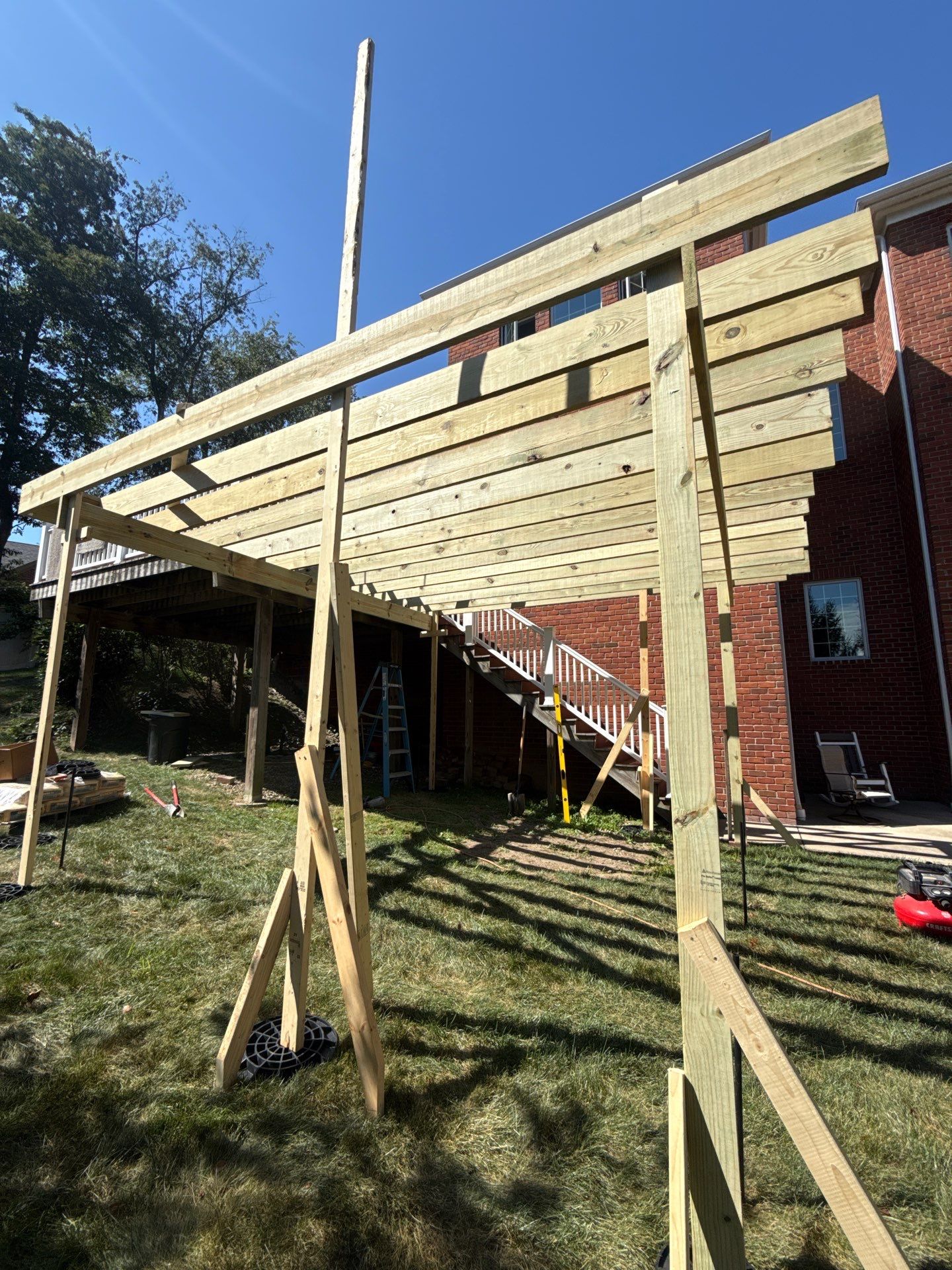 Deck extension  by Cousins Roofing Siding & Decks