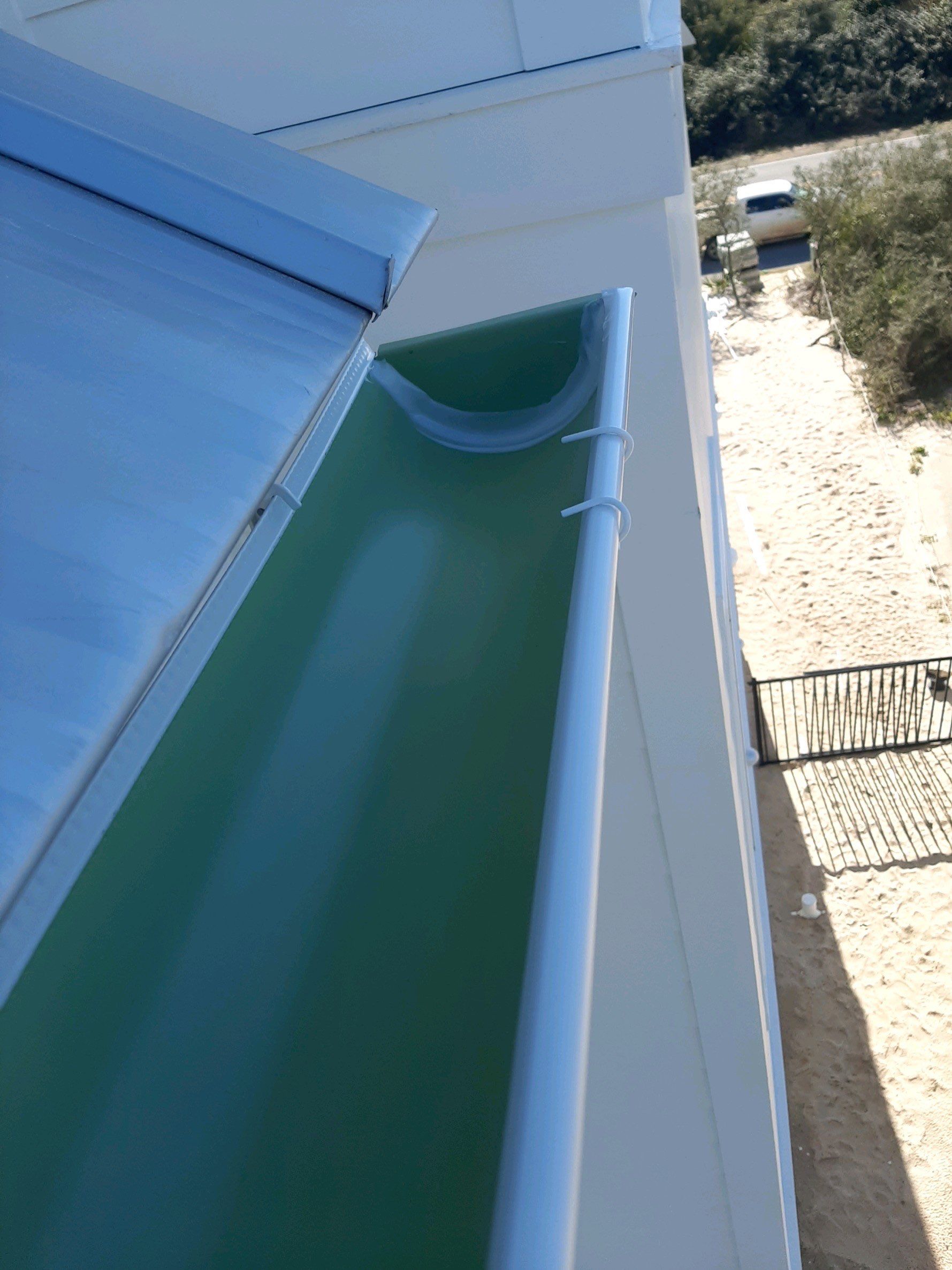 Gutter Installation Using 6 Inch Seamless Aluminum Gutters by Gutter Professors