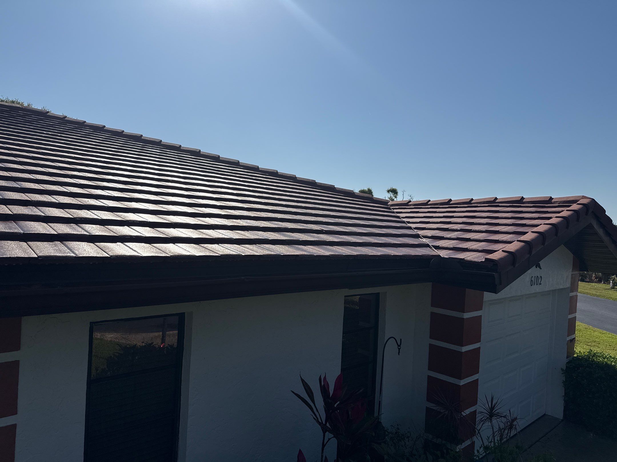 Tile Roof Cleaning – Vivenda at Bradenton I (5-Star Review & Plant Protection) by Sunshine AquaWash