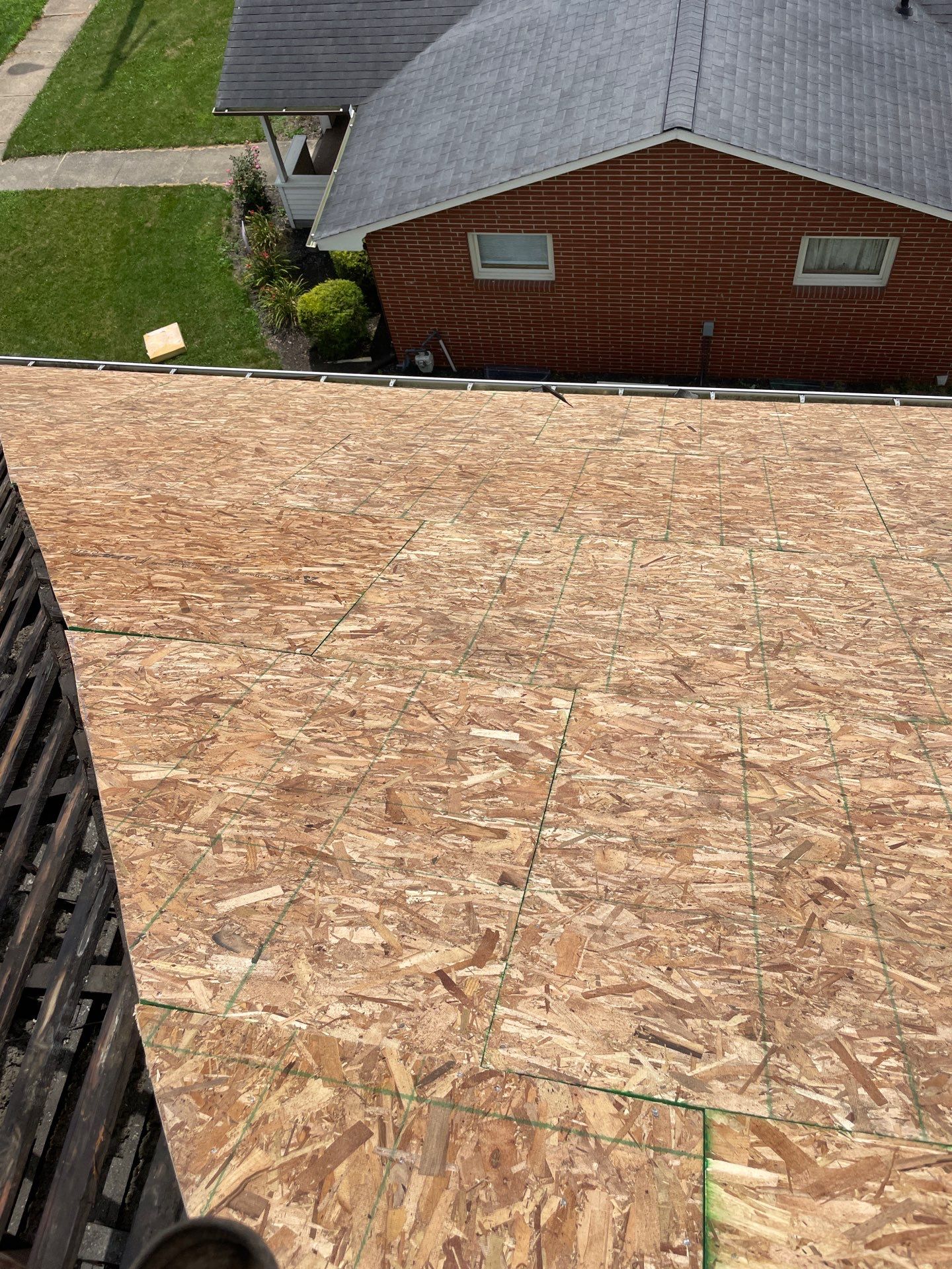 Residential Roofing Installation using GAF Timberline HDZ Charcoal by Rainstoppers Roofing