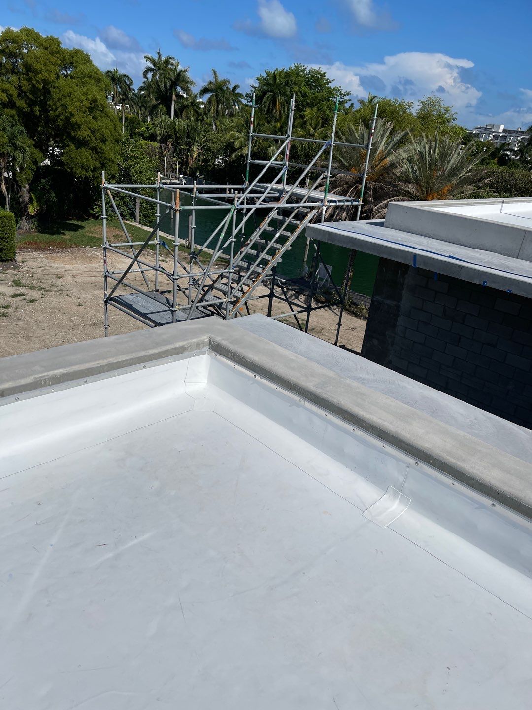 TPO Flat Roof Installation for a Miami Beach Commercial Residence by AJF ROOFING INC