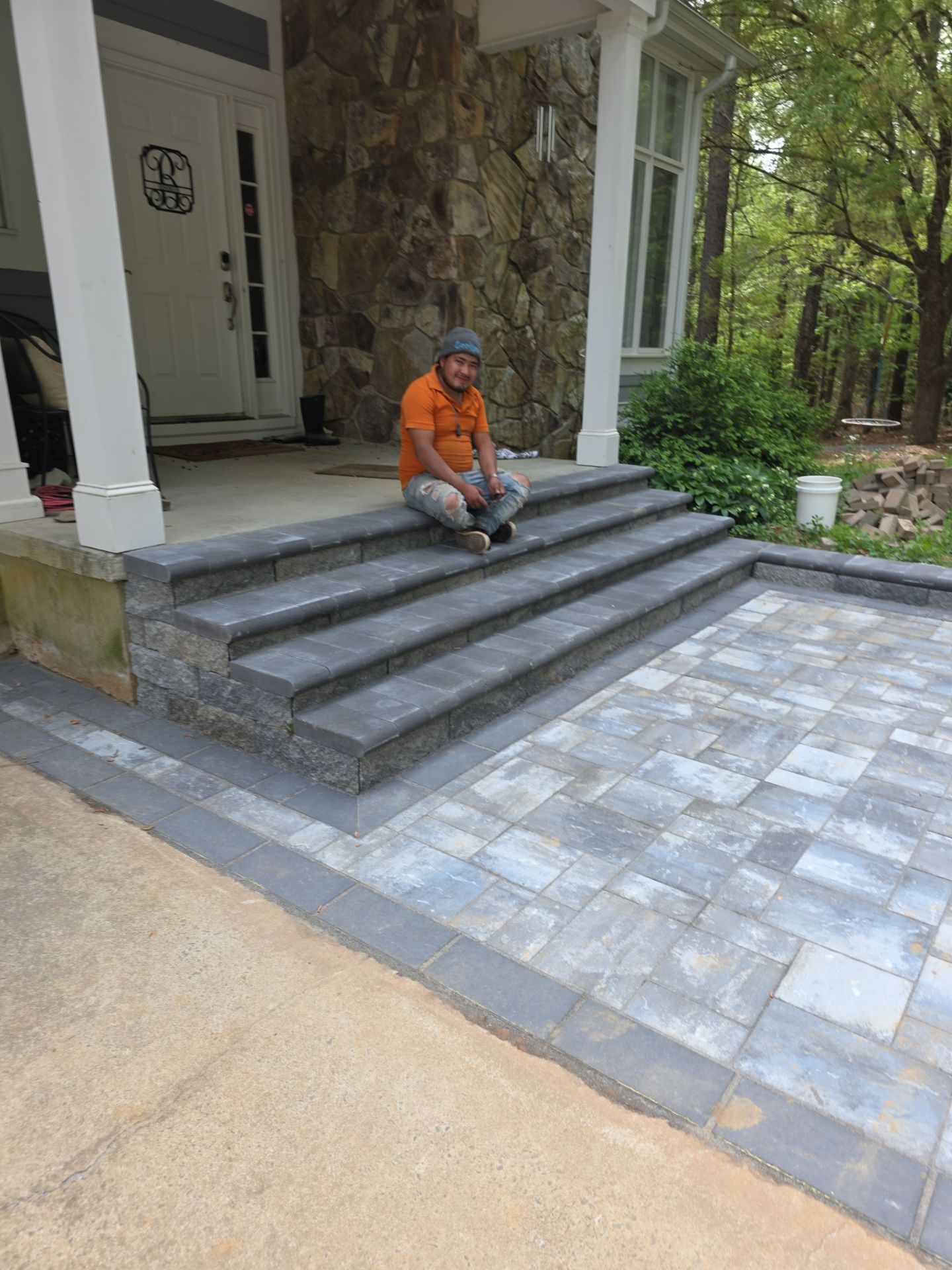 Pittsboro Outdoor Living Transformation – Retaining Wall, Paver Patio & Elevated Deck by Elite Remodeling and Design LLC
