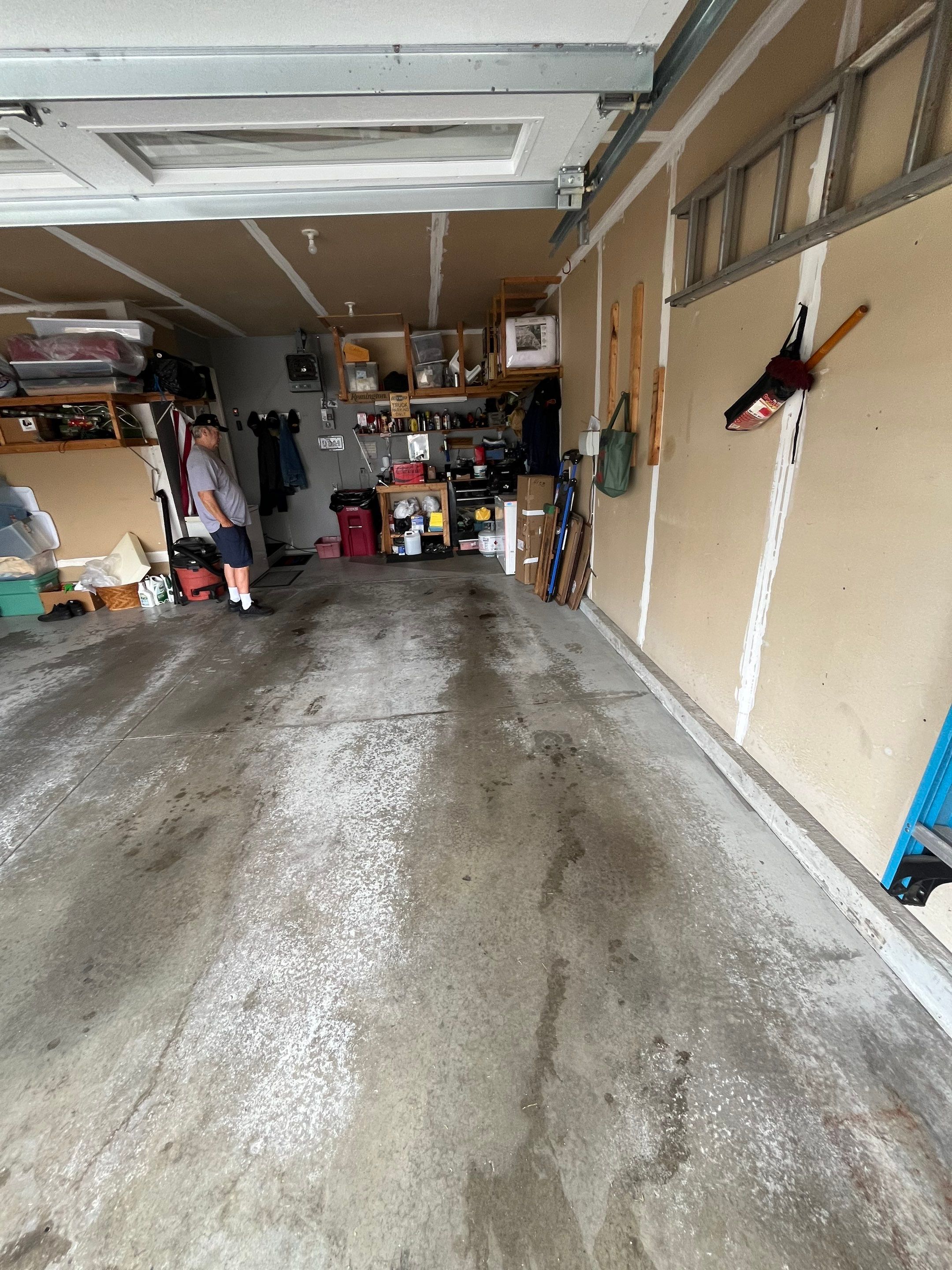 Nightfall Grey Speckled Epoxy Garage Floor Coating in Sioux Falls by Select Painting, Coatings & Garage Cabinets