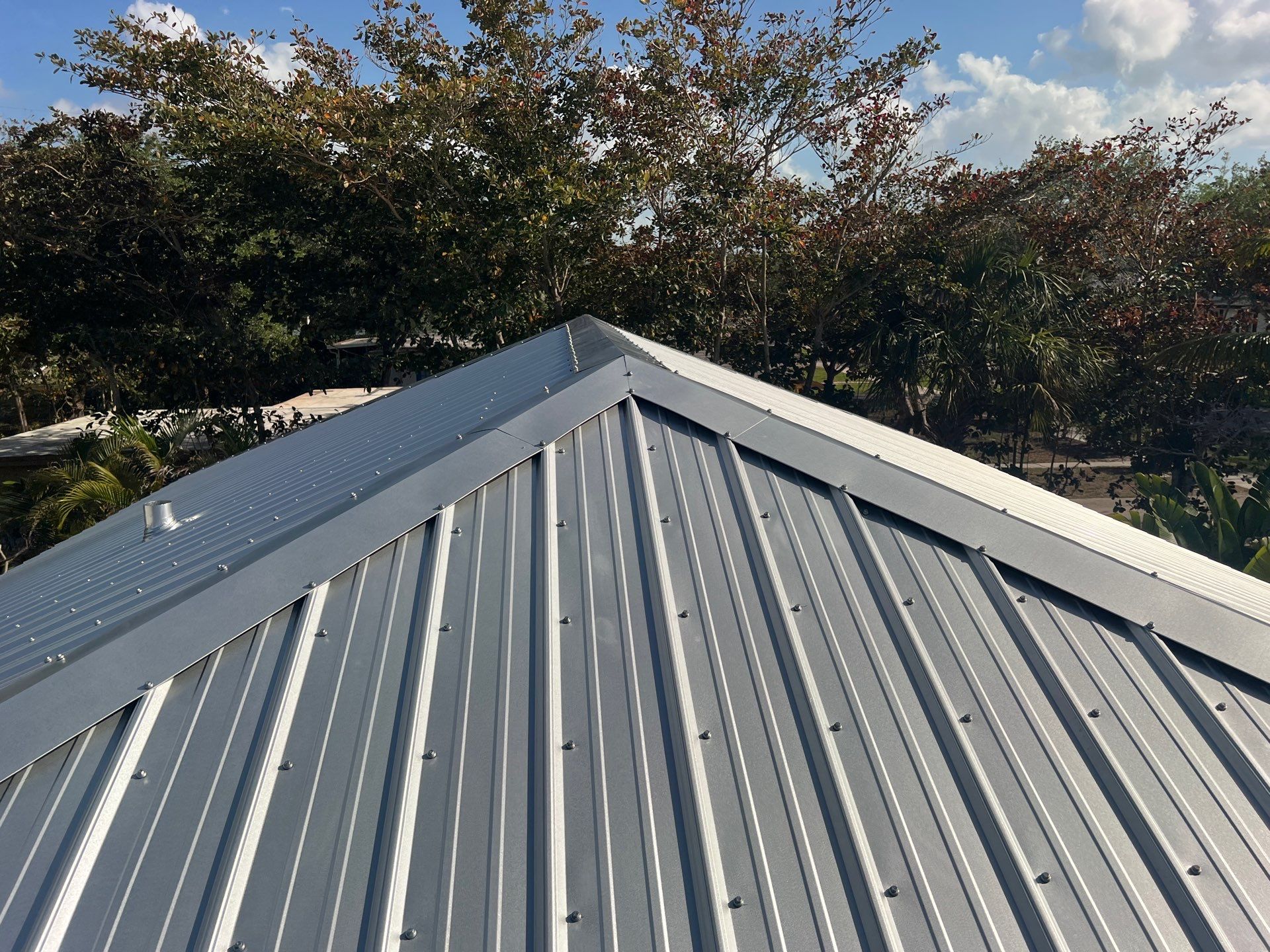 Residential Roofing Installation using Durabull Classic Rib Panel by Durabilis Roofing INC