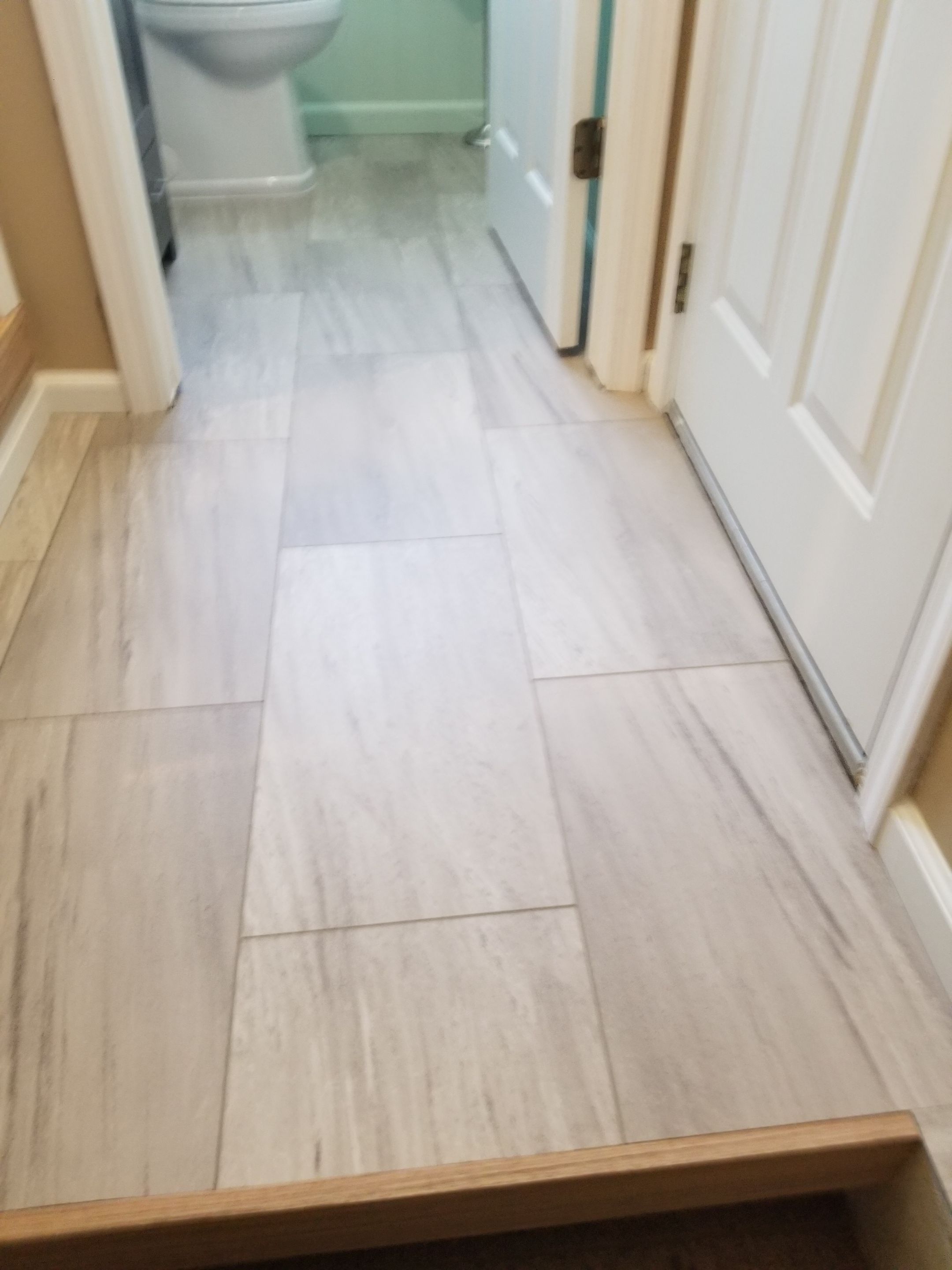 Remodel full bathroom new tile walk in shower plus 2nd half bath Powder room in Livonia, MI by Northwest Construction