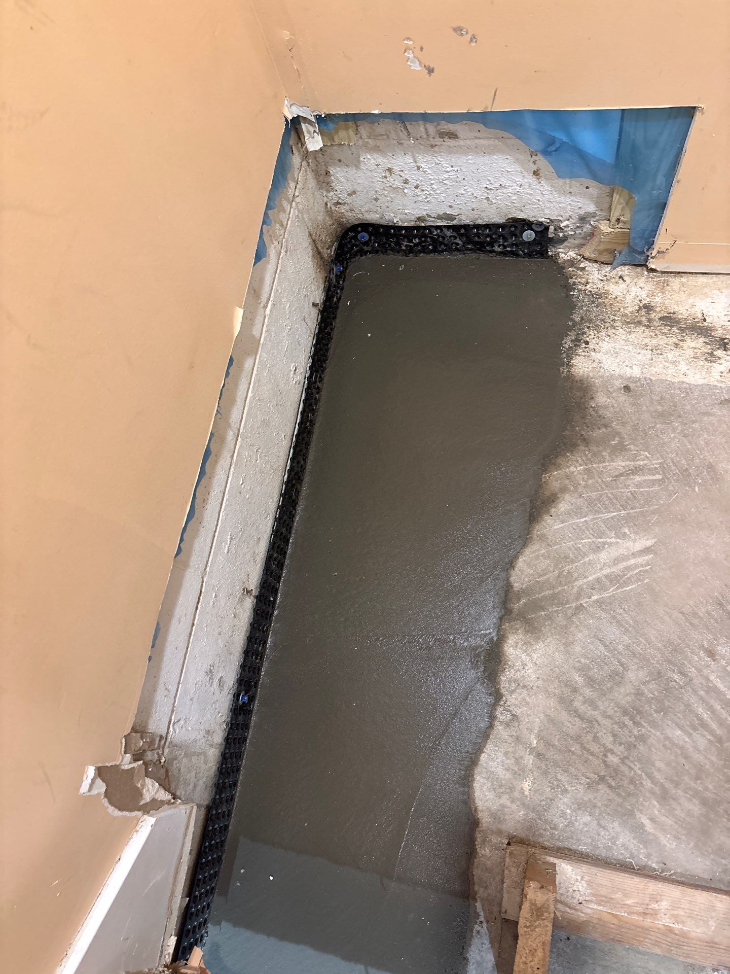 Interior Drain Tile Installation in Minnetonka, MN by Waterproofing Northeast