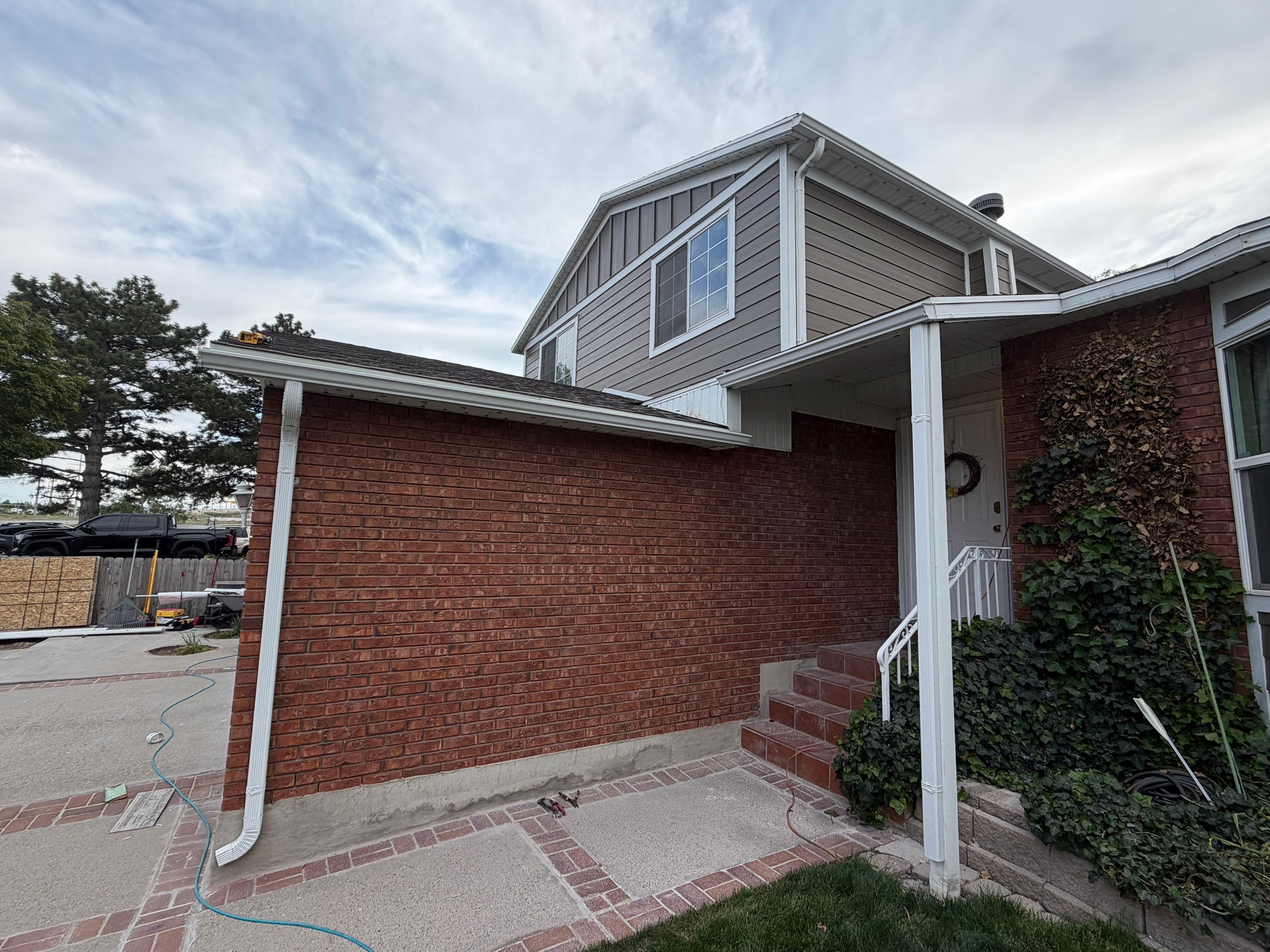 West Valley City | Aluminum to Hardie Conversion | Timber Bark & Arctic White by Ideal Siding Utah
