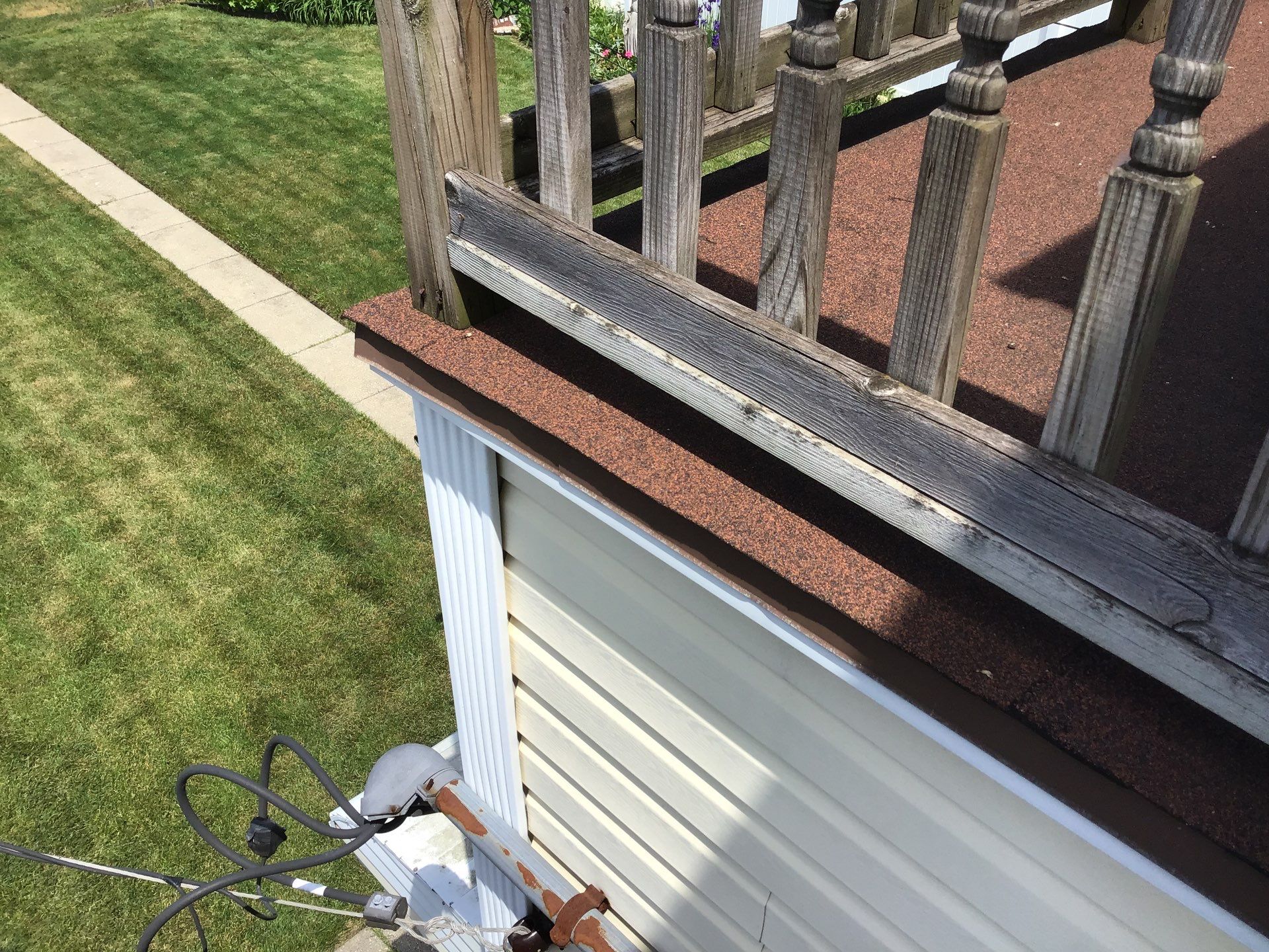 Rebuild balcony flat roofing TREX decking stairway and Railings in Wyandotte, MI by Northwest Construction 