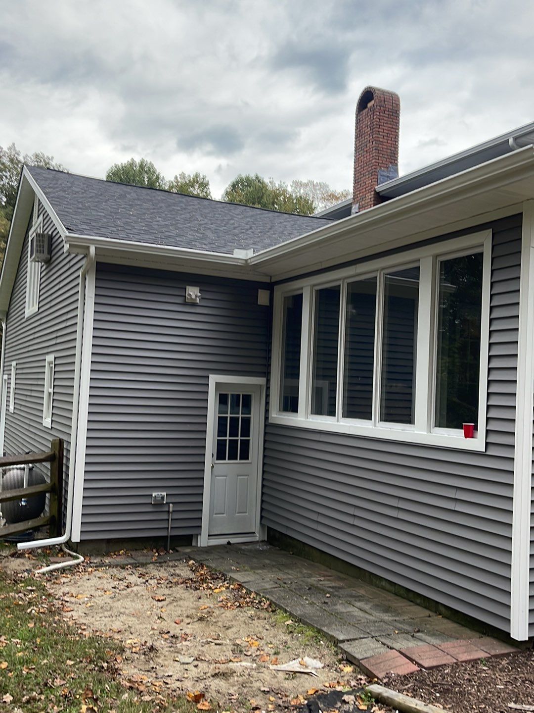 Residential Roofing Installation using Owens Corning TruDefinition Duration AR - Onyx Black & New Siding Using Mainstreet Charcoal Gray by A Plus Exterior