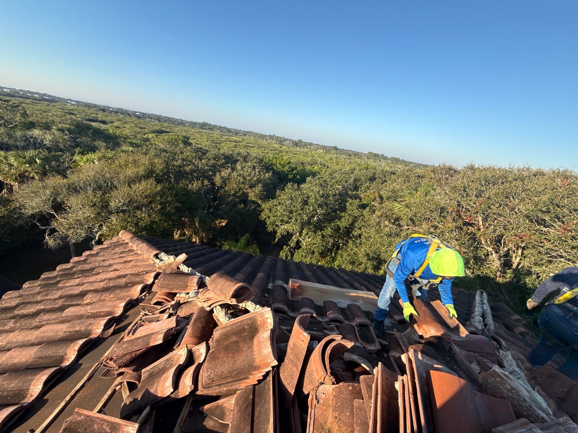 Flagler Beach Residential Tile Roof Replacement with Dark Barrel Tiles by Fortified Roofing Solutions Corp.