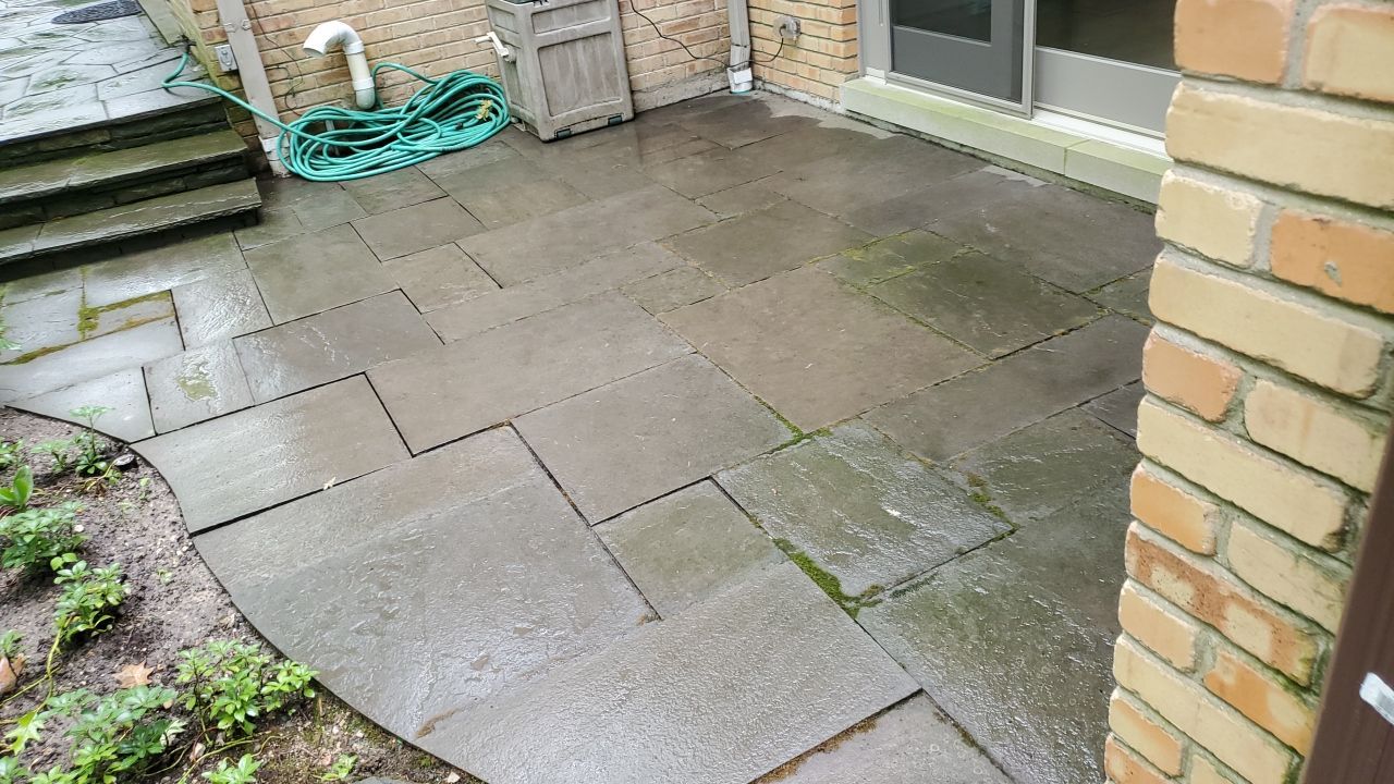 Bluestone patio cleaning by Northern Power Washing LLC.