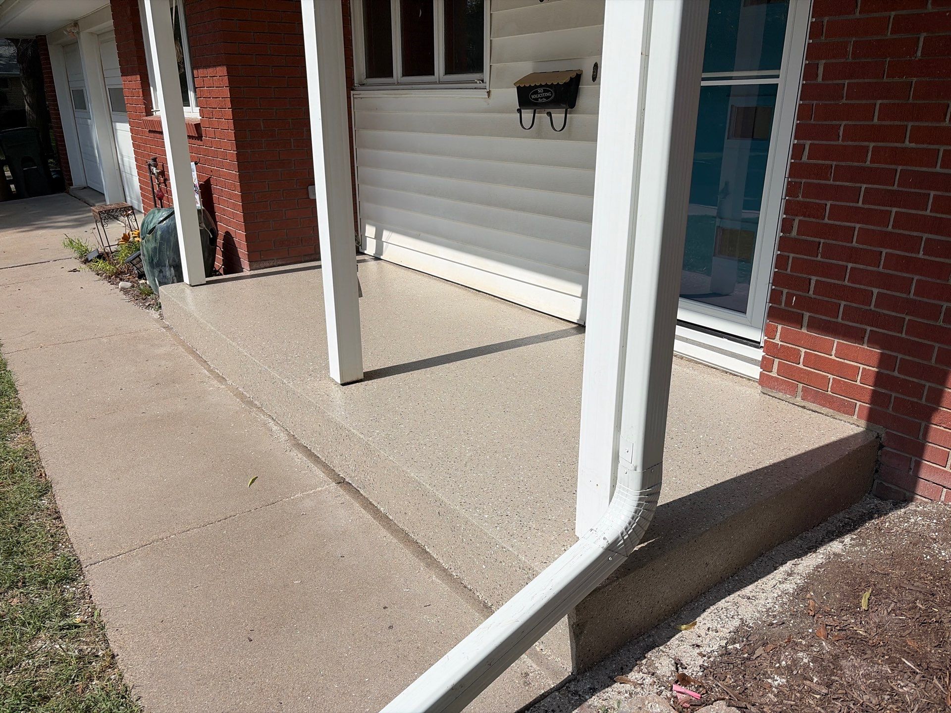 Lincoln Front Porch Restoration with Hybrid Flake Coating by Goat Coatings