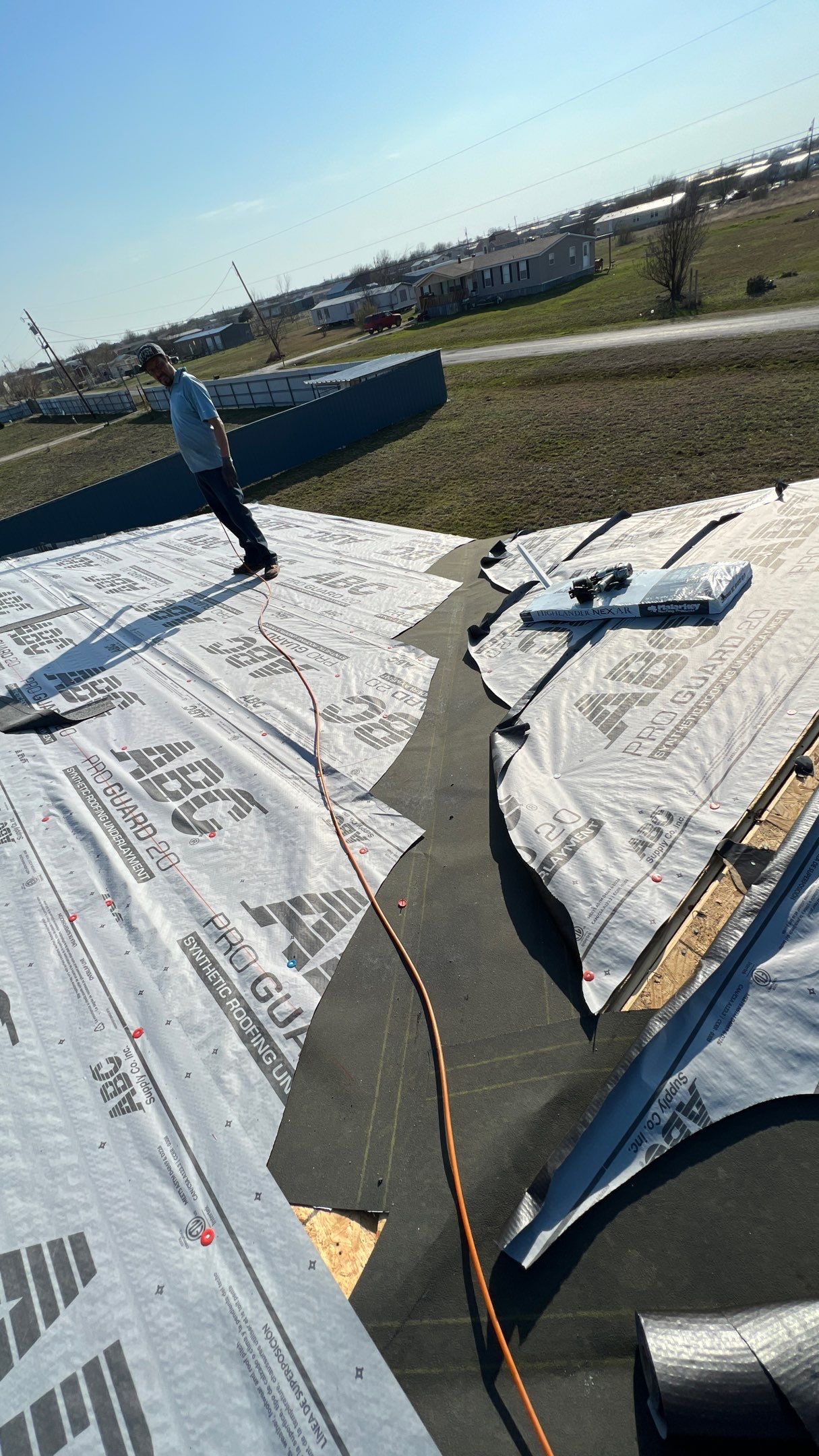 Residential Roofing Installation using Roofing Shingles by Harvey Roofing & Construction