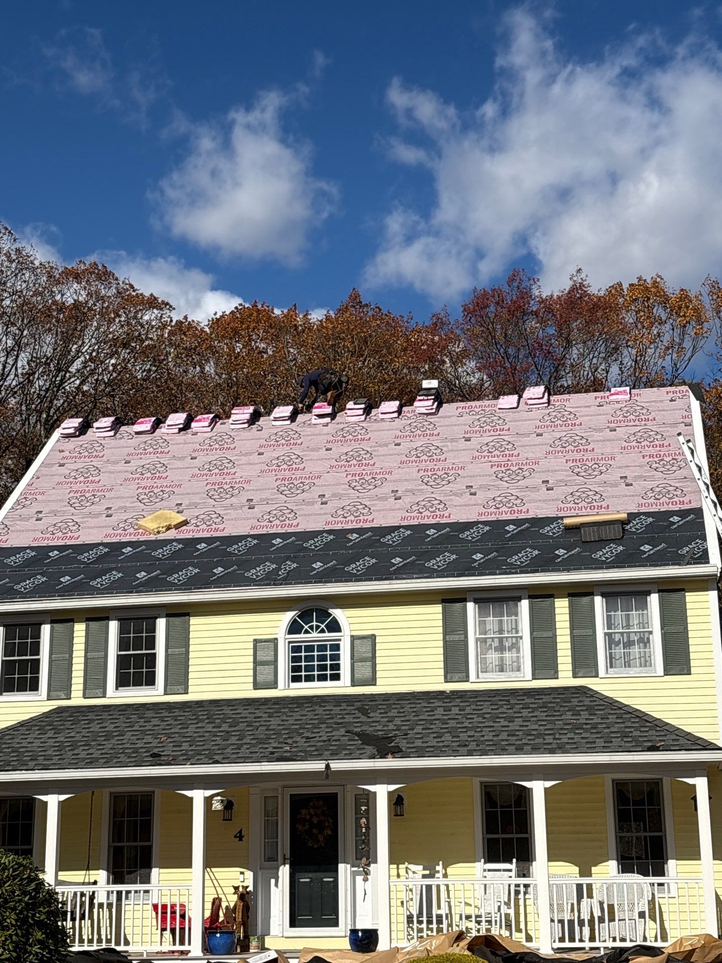 Chelmsford Premium Roof: Onyx Black Shingles with Standing Seam Metal Porch by Mighty Dog Roofing of Greater Middlesex County