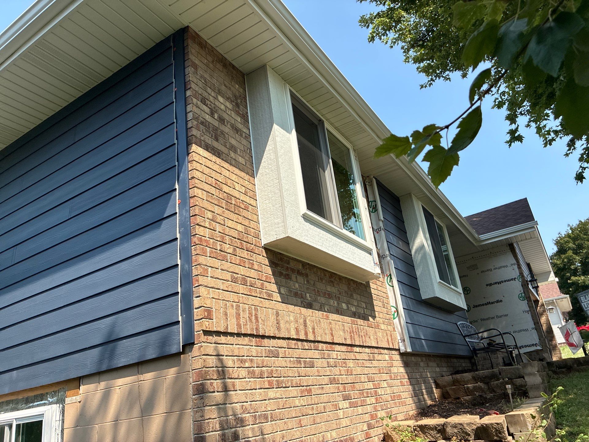 Full Window Replacement and James Hardie Siding Update in Papillion by Carps Complete Exteriors