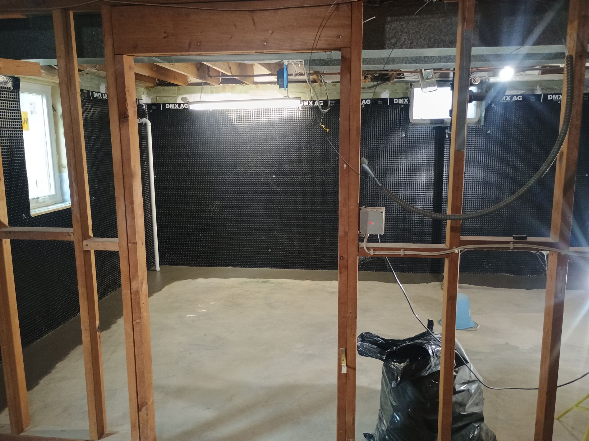 Interior Drain Tile & Wall Drainage in Southwest Minneapolis by Waterproofing Northeast