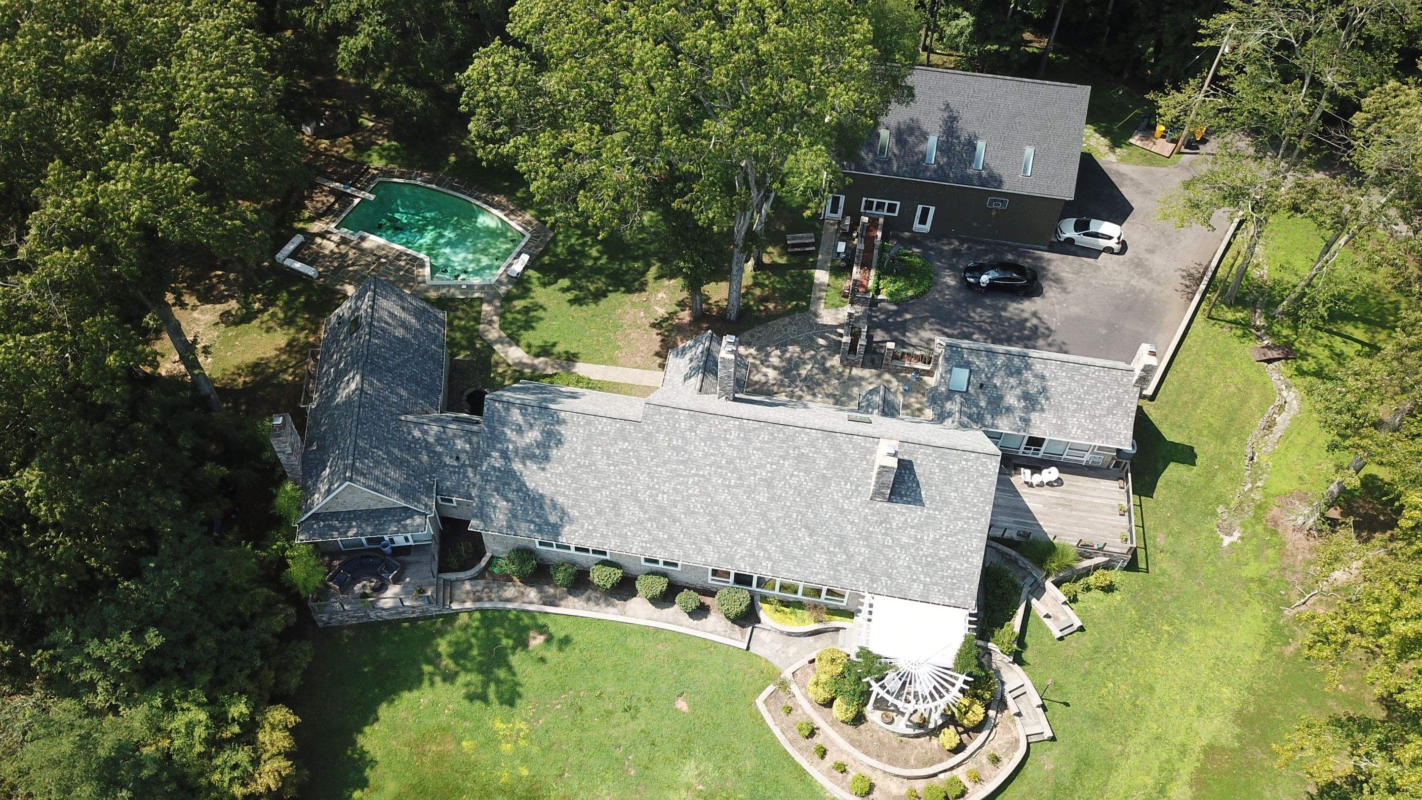 Roof Replacement using IKO Dynasty by American Home Contractors