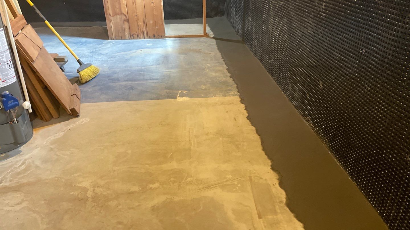 Interior Drain Tile & Buried Discharge in South Minneapolis by Waterproofing Northeast