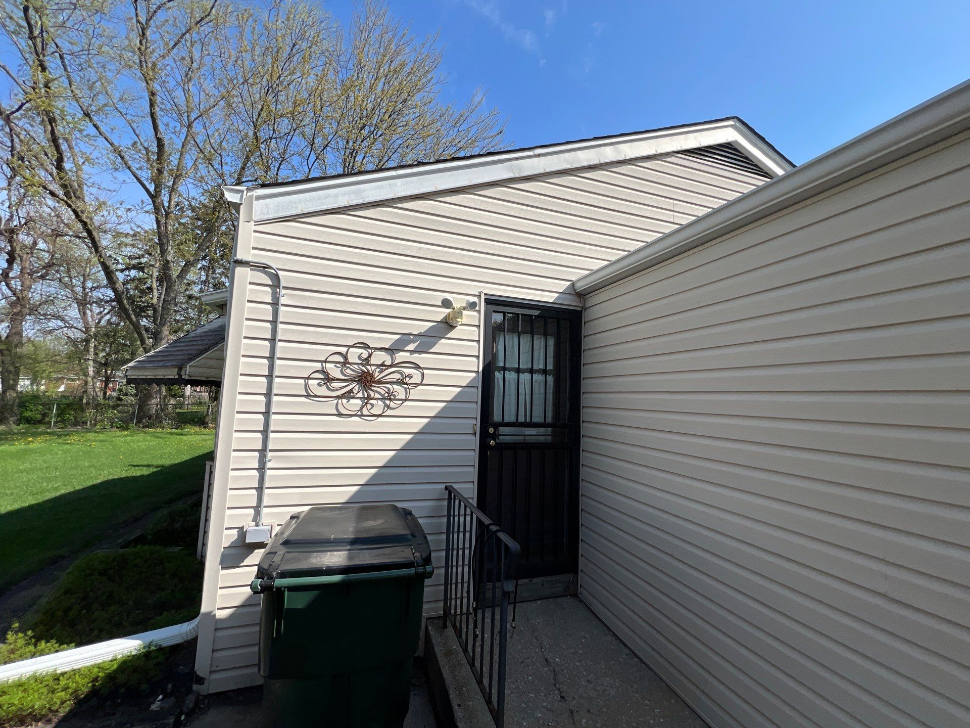 Housewashing  using Algaecide, soft wash soap by Northern Power Washing LLC.
