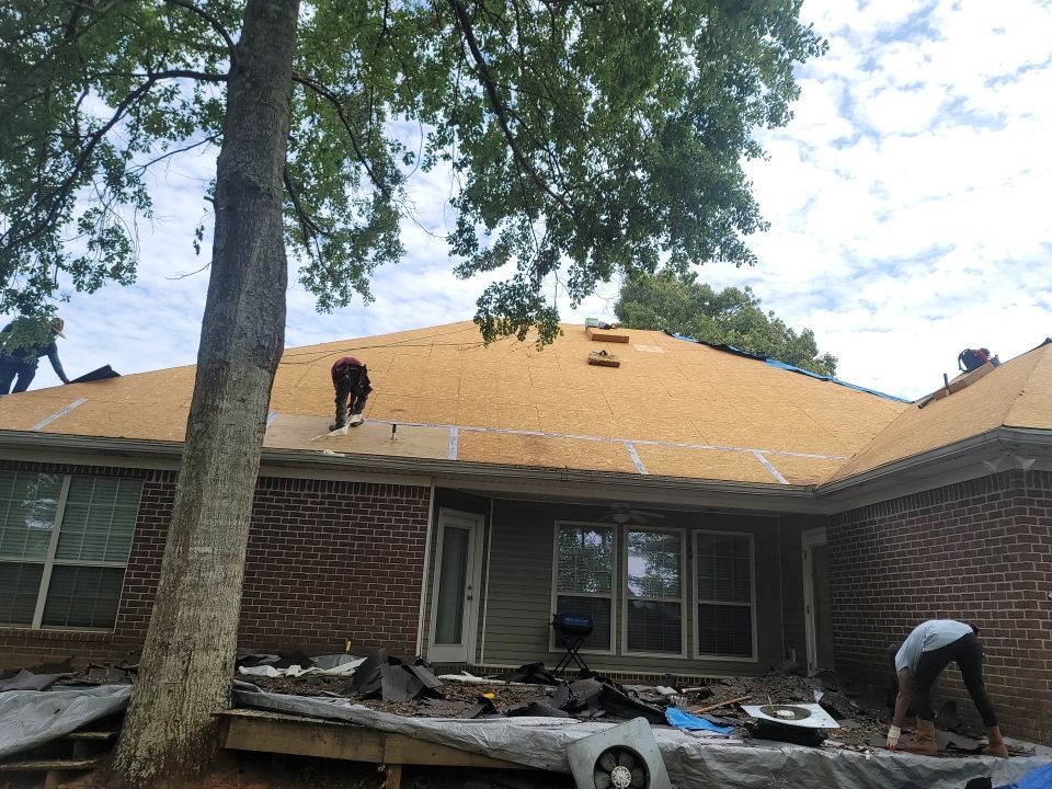 Residential Roofing Installation using Roof Replacement by American Roofing & Construction LLC