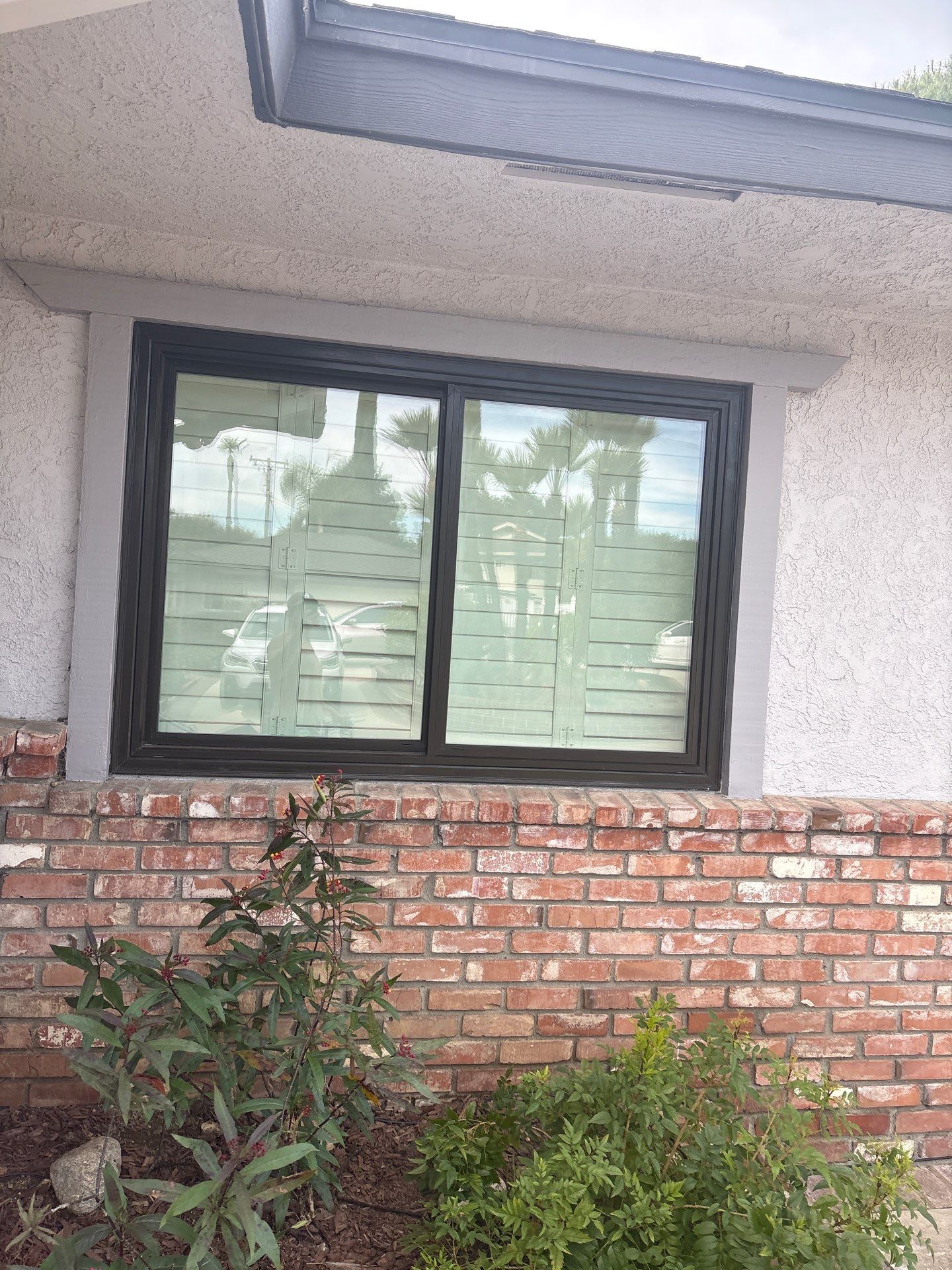New Dark Frame Milgard Window and Sliding Door Installation in Covina by American Window Company
