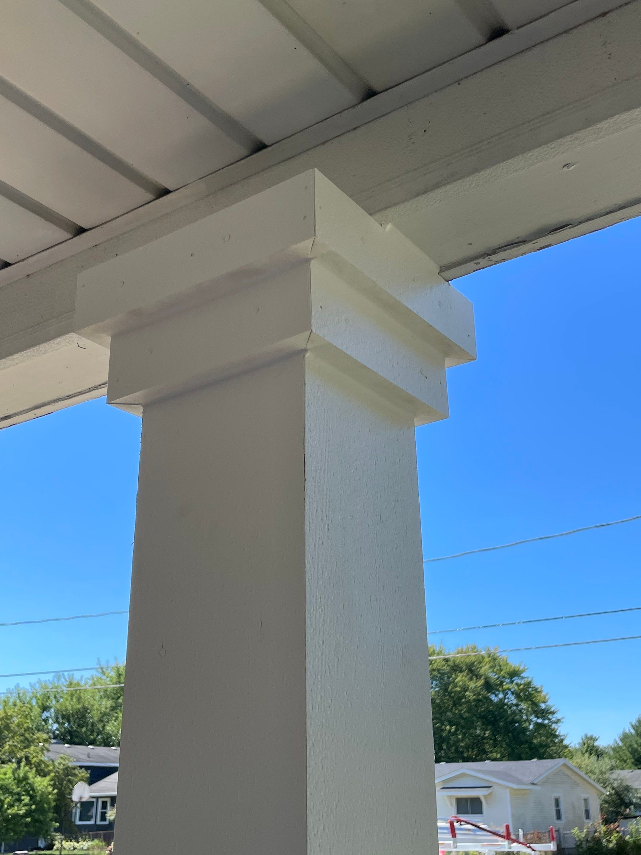 Front Porch Posts and Treated Porch Floor and Steps by Avalon Roofing and Exteriors