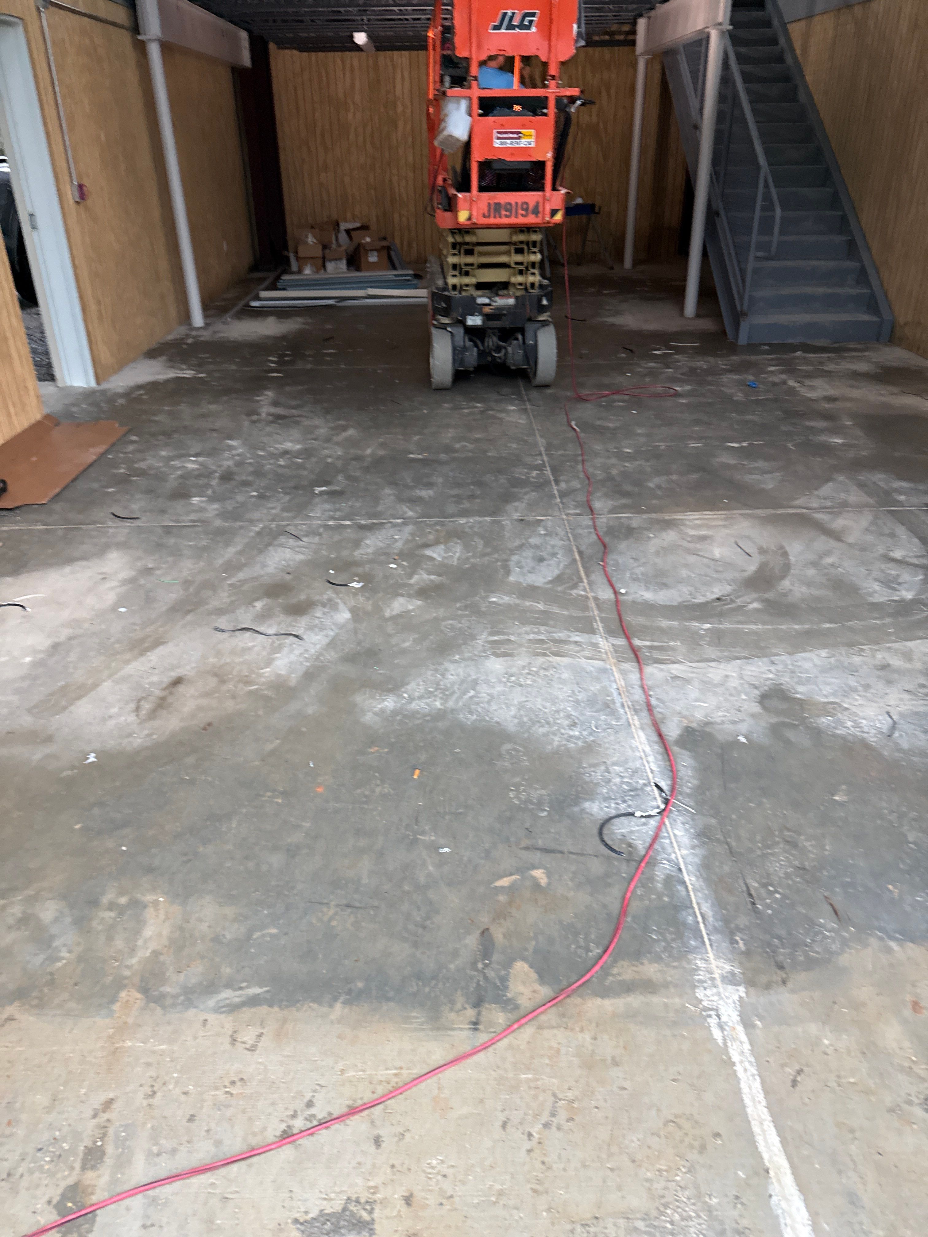 Industrial Epoxy Flooring for Sandhill Crane Workshop in Gautier by Cornerstone Hard Surface Restoration 