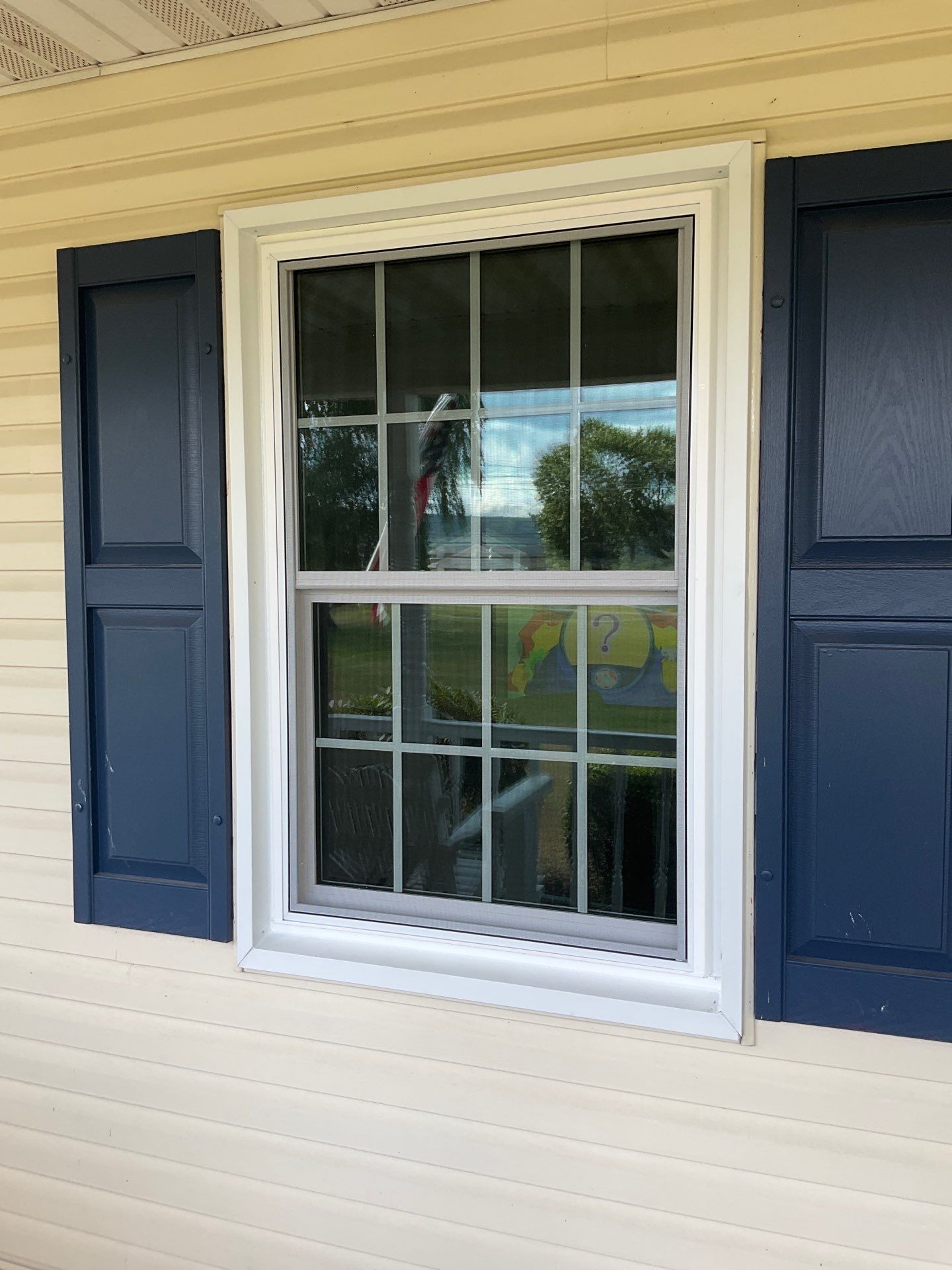 Shingle Roof-biscayne blue- and windows by Esh Builders