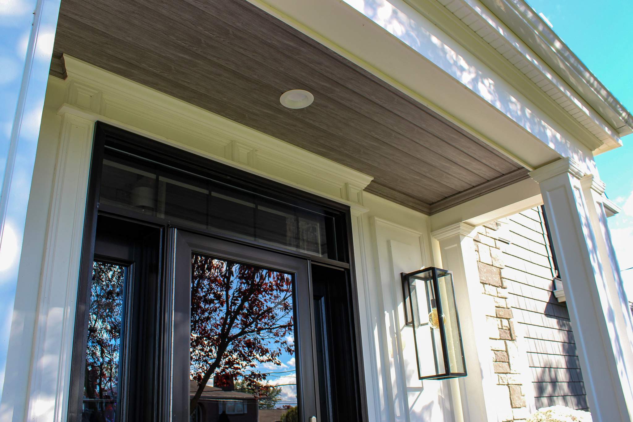 Exterior Renovations- Siding, Concrete, Railings, and Entry Door  by Ivy Lea Construction