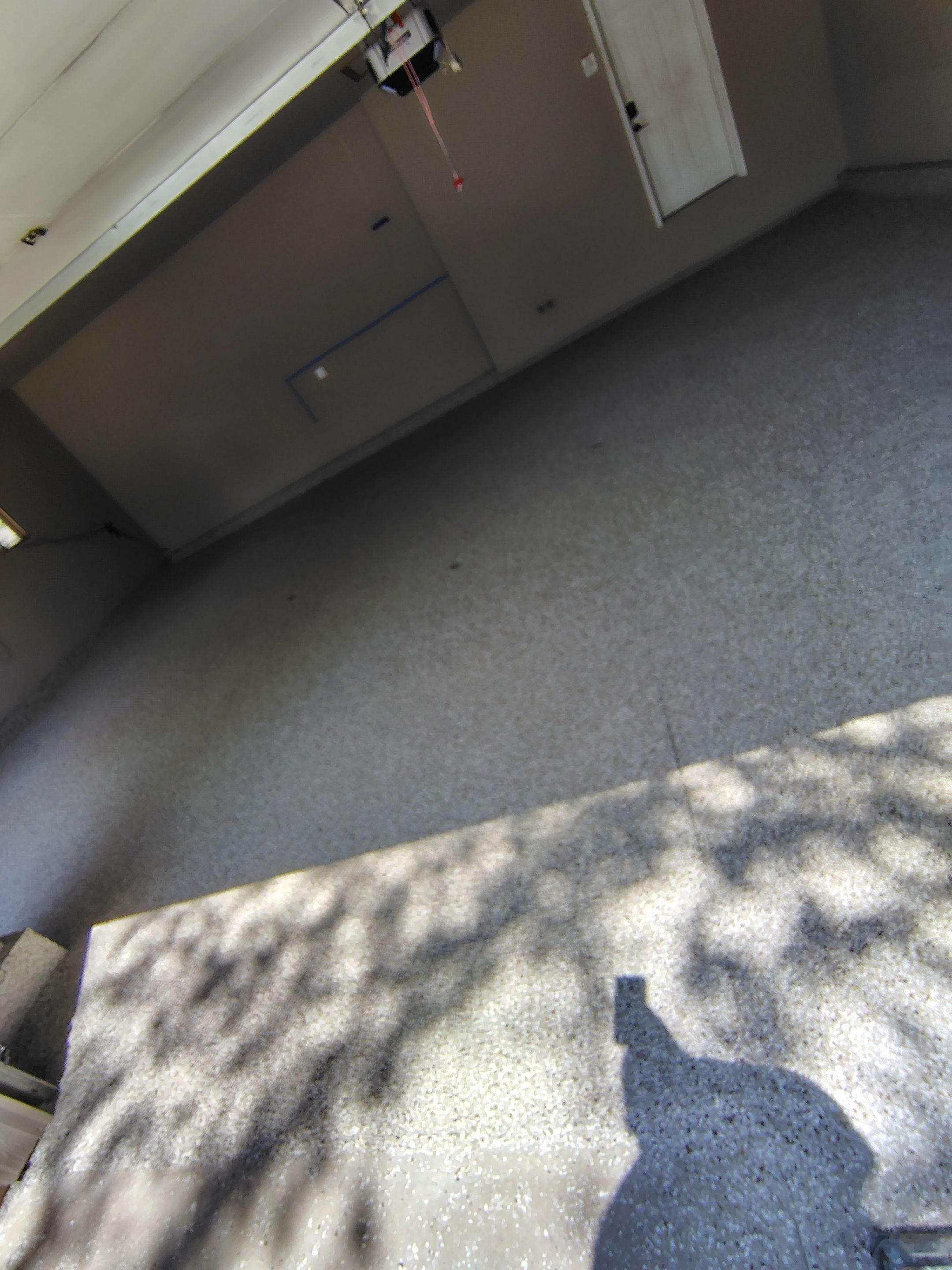 Sioux Falls Garage Concrete Repair and Epoxy Flake Floor Coating by Select Painting, Coatings & Garage Cabinets