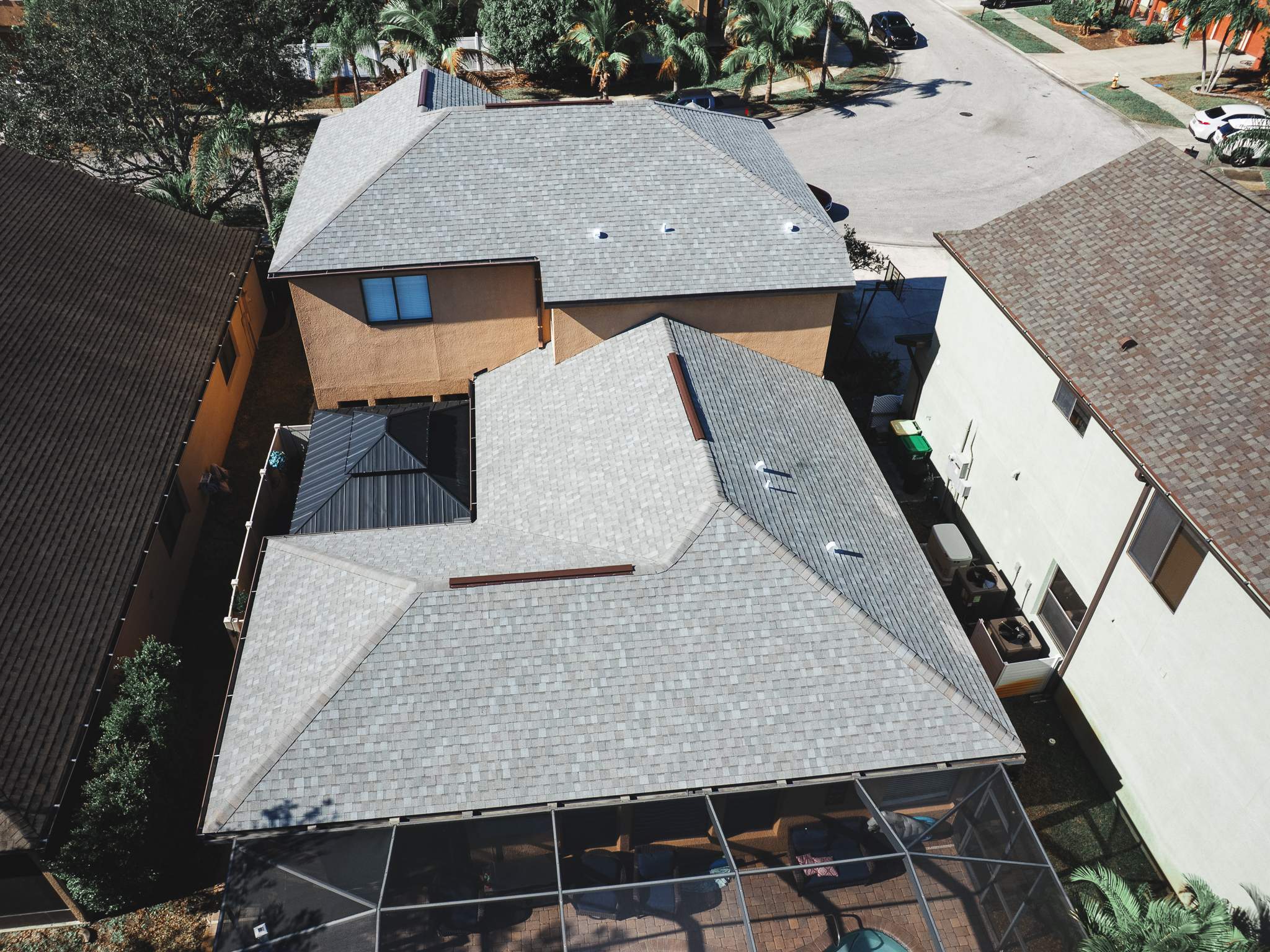 Merritt Island Roof Replacement for Two-Story Home Using Architectural Shingles by Wiedmann Construction & Roofing