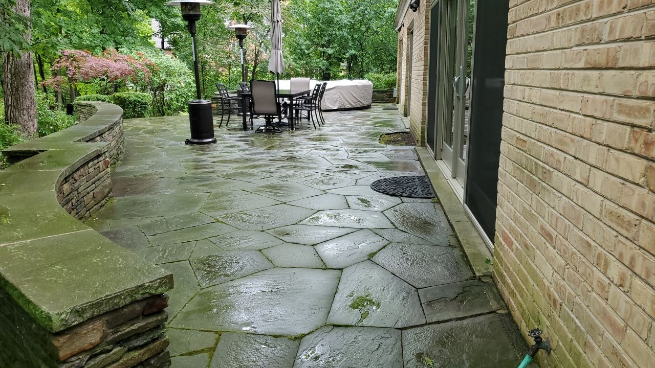 Bluestone patio cleaning by Northern Power Washing LLC.