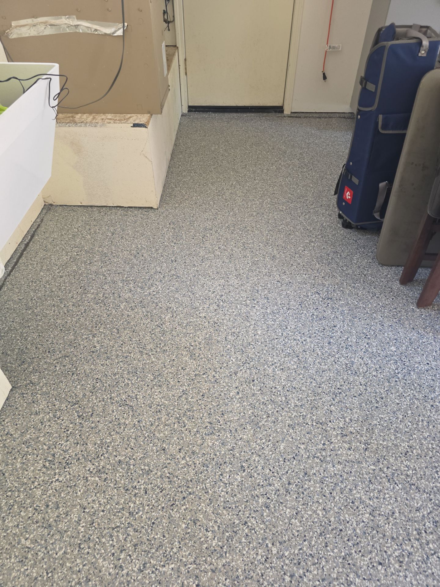Polyurea Garage Floor Transformation with Stonewash Chips in Cambria by MGP Coatings