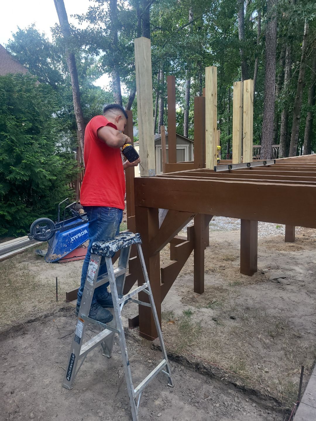 Fuquay-Varina Outdoor Upgrade – Composite Deck & Paved Landing by Elite Remodeling and Design LLC