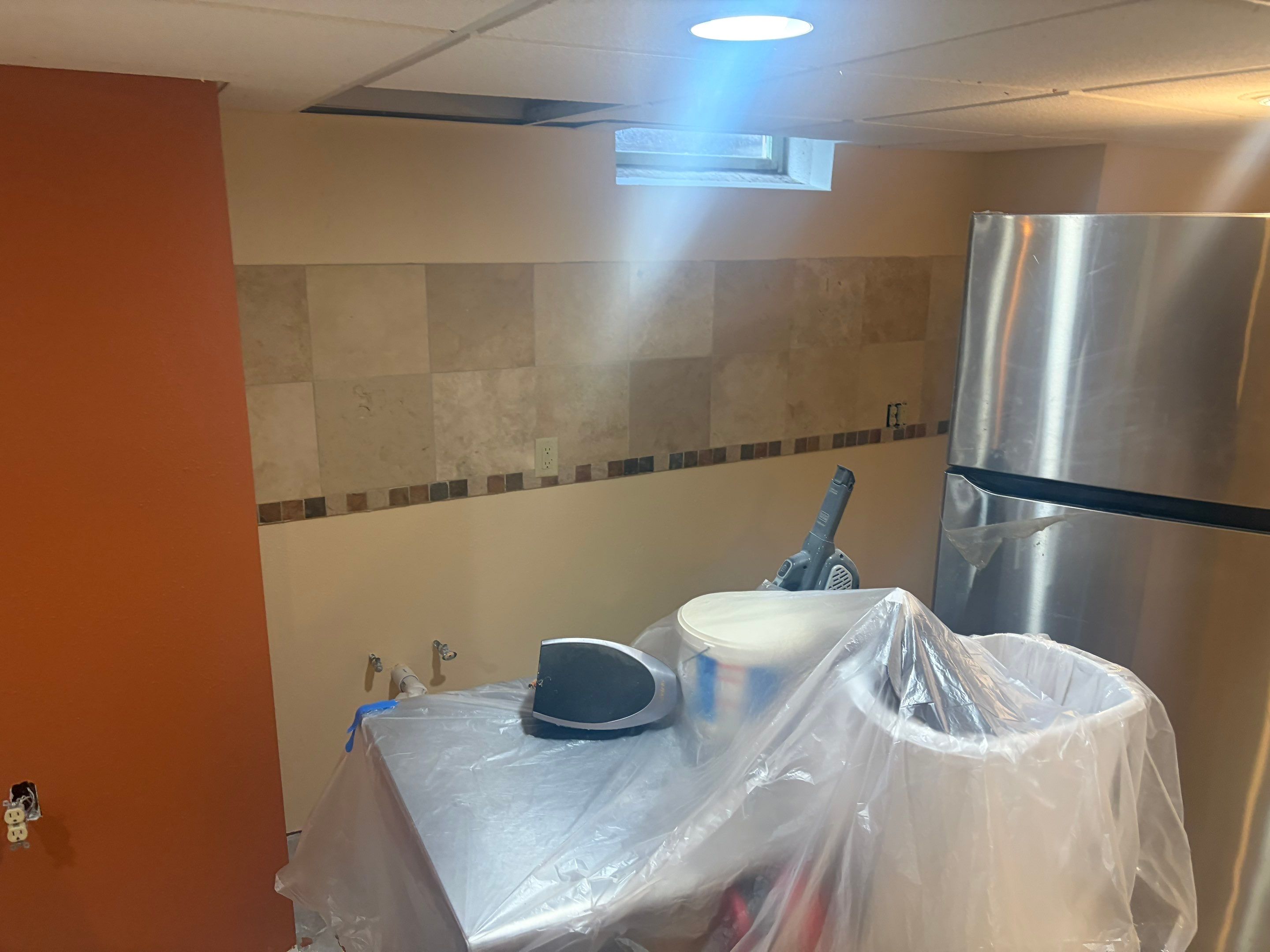 Basement Kitchen Renovation and Interior Wall Finishing in Brookfield by OCS Contracting Services