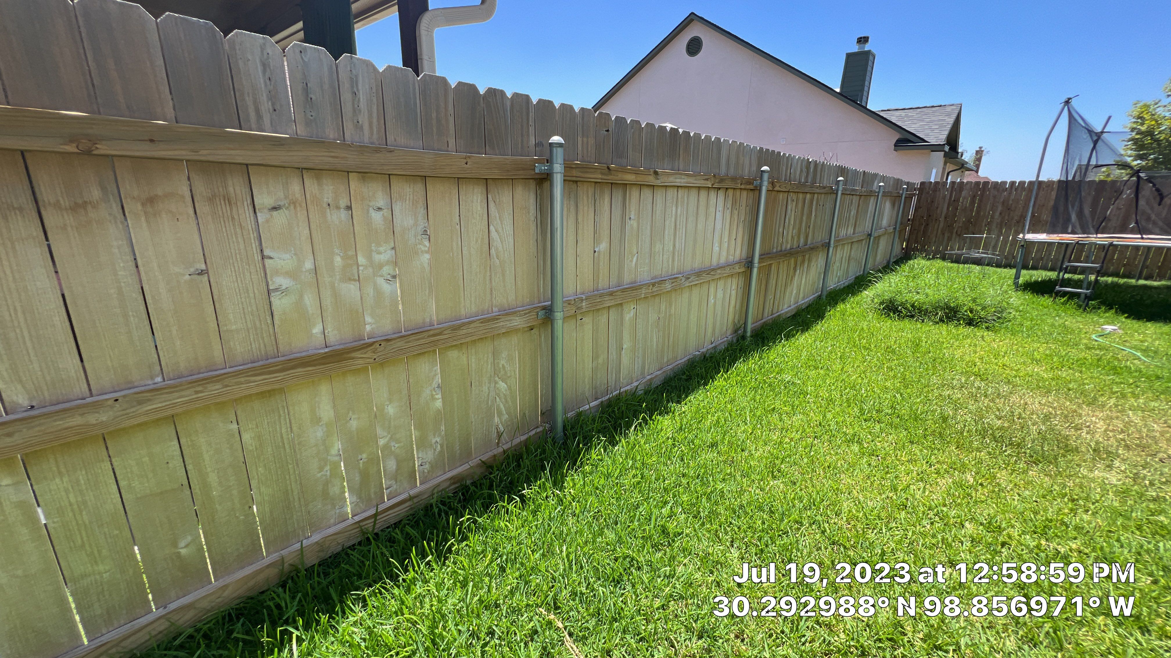Fredericksburg Residential Roof Replacement and Custom Cedar Privacy Fence by Caliber Restoration LLC
