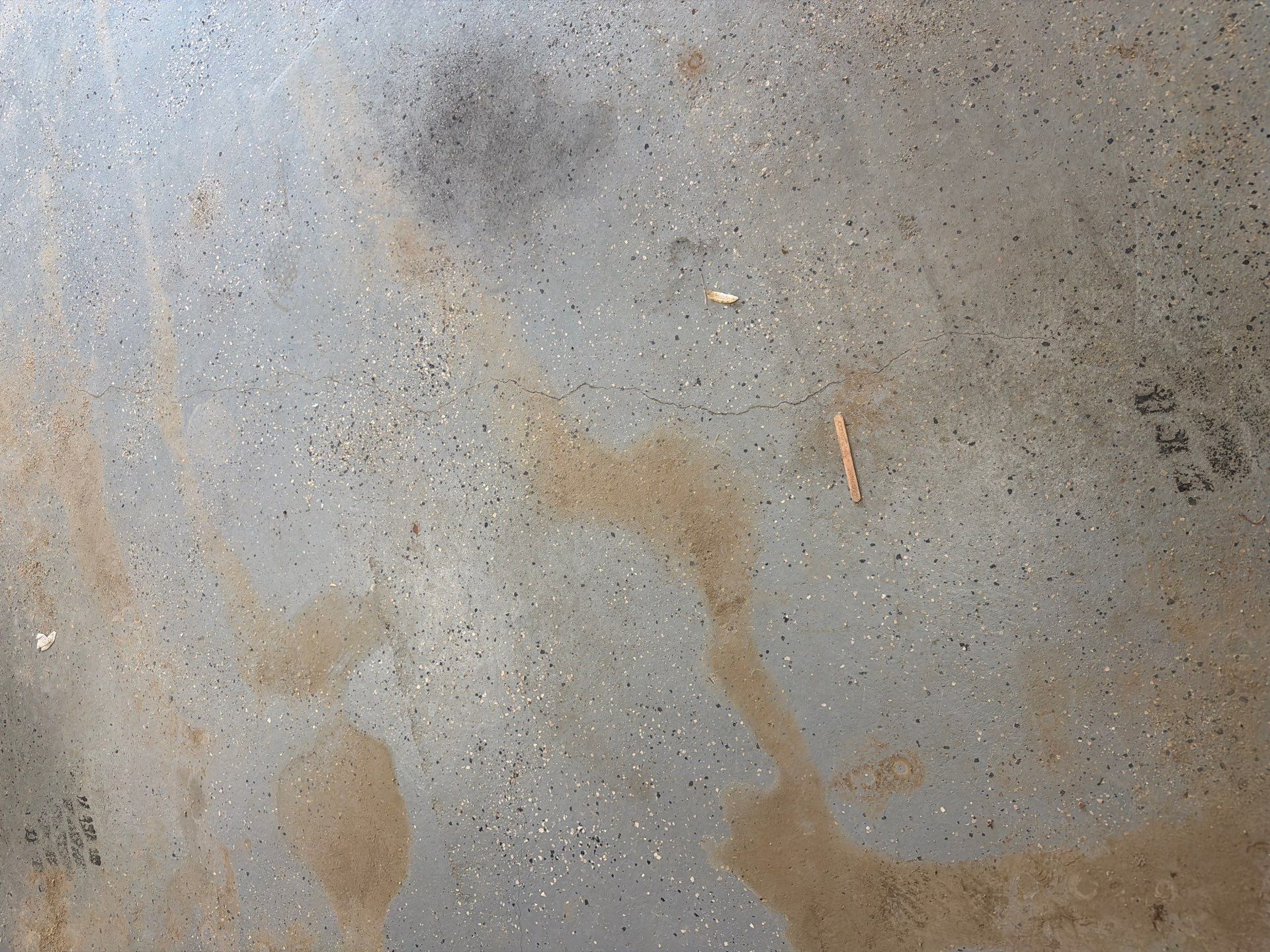 Custom Grey Flake Epoxy Garage Floor Installation in Remsen by Select Painting, Coatings & Garage Cabinets