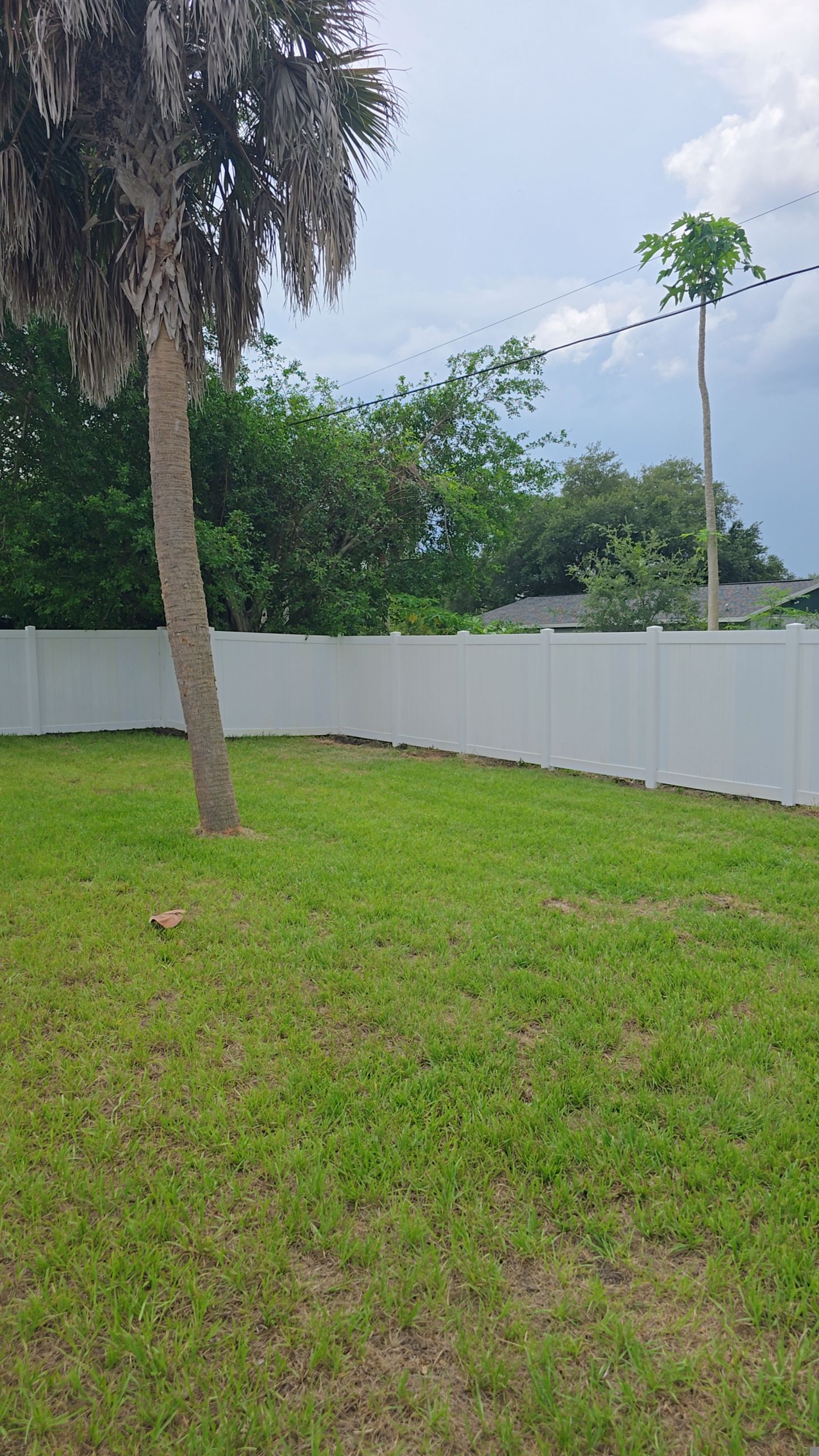 White Vinyl Privacy Fence Installation and Gate Repair in Port Charlotte by True Fence LLC