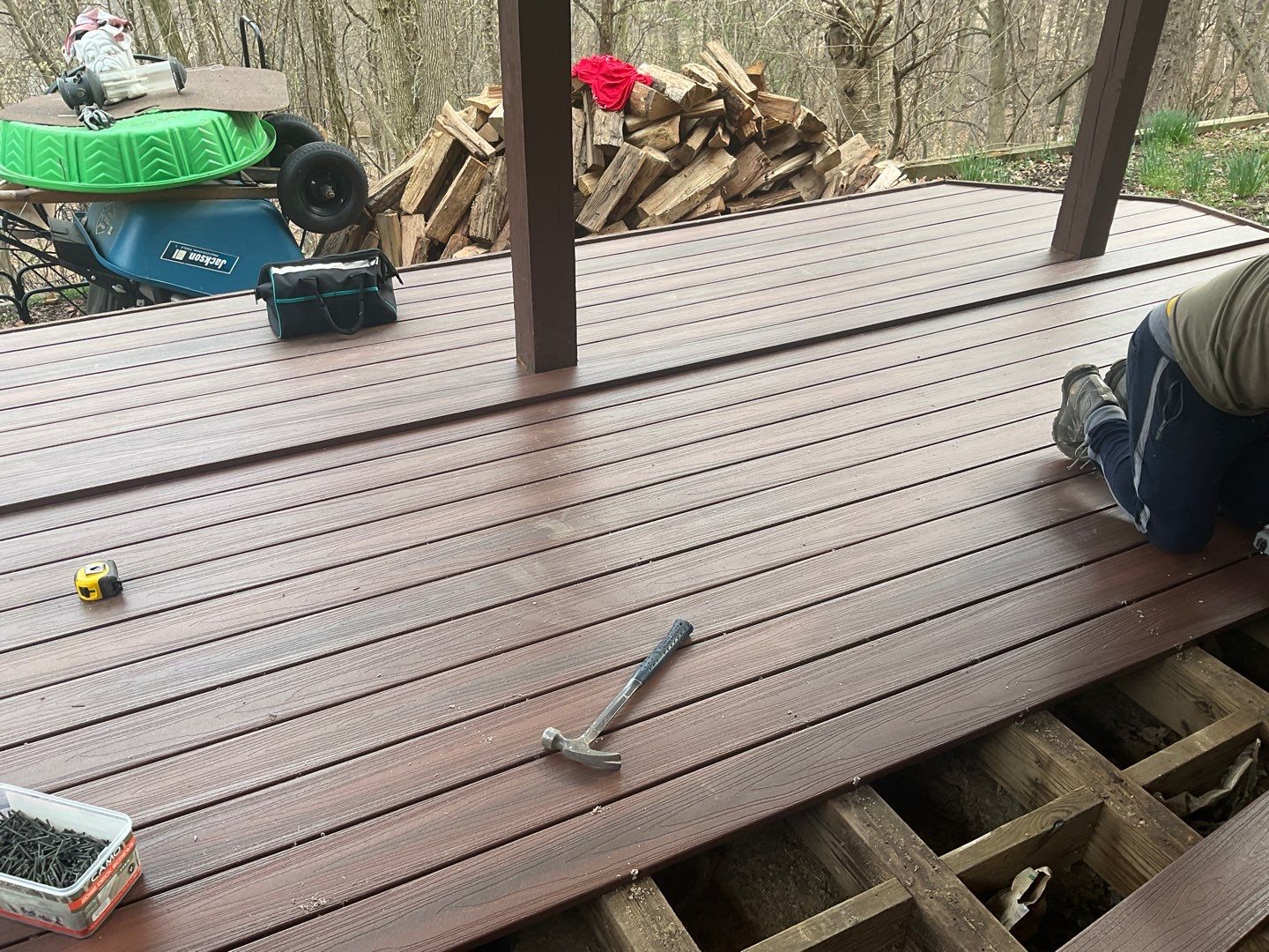 Deck Installation using New Composite Deck Board by Alpha Design Services