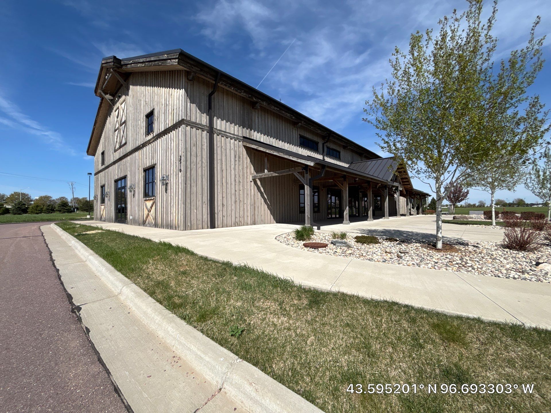 Commercial Exterior Wood Staining for Sanford Barn in Sioux Falls by Select Painting, Coatings & Garage Cabinets