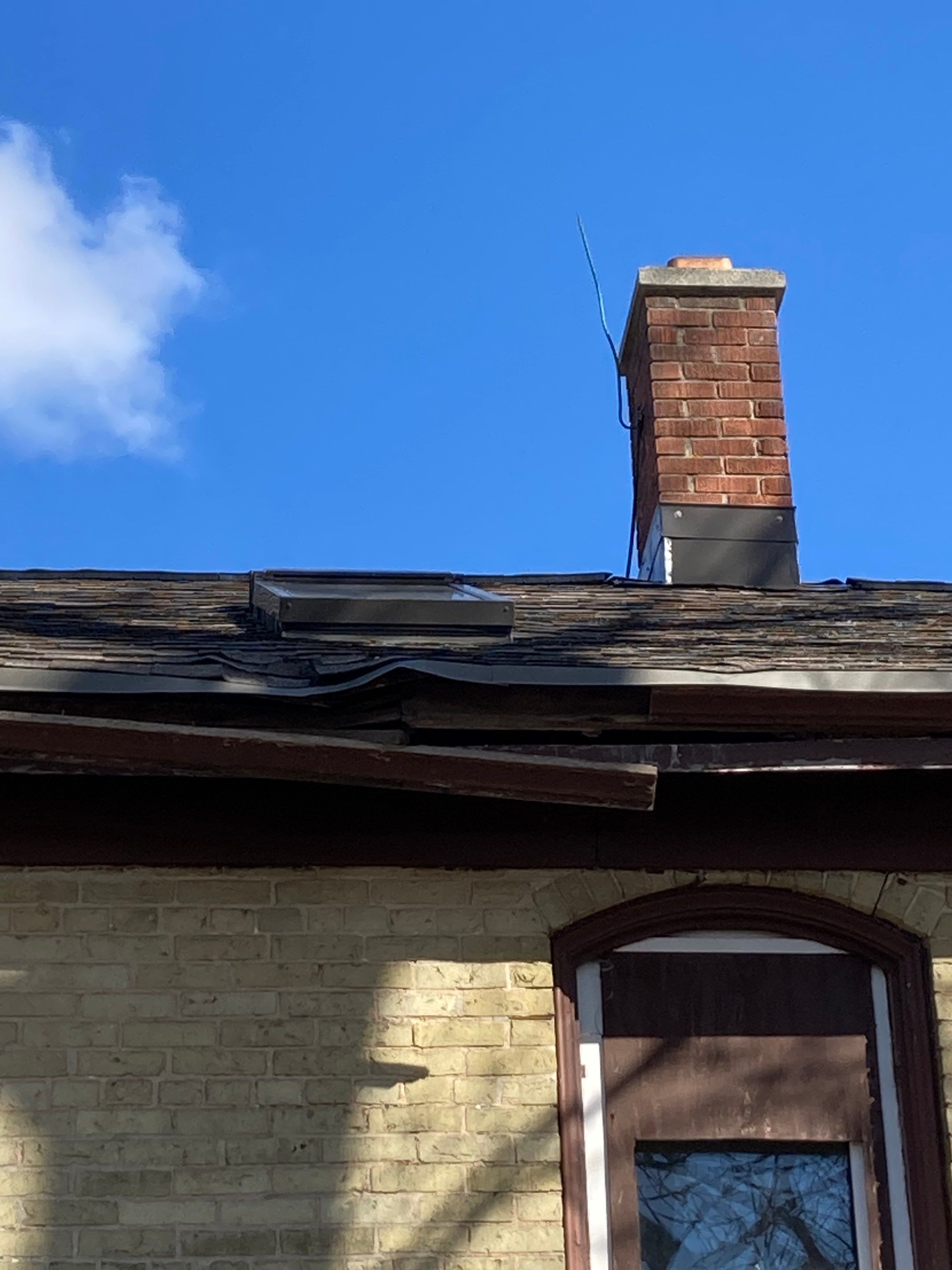  Metal Roof Installation on Residential Brick Home in Oostburg, WI by Gellings Roofing & Siding